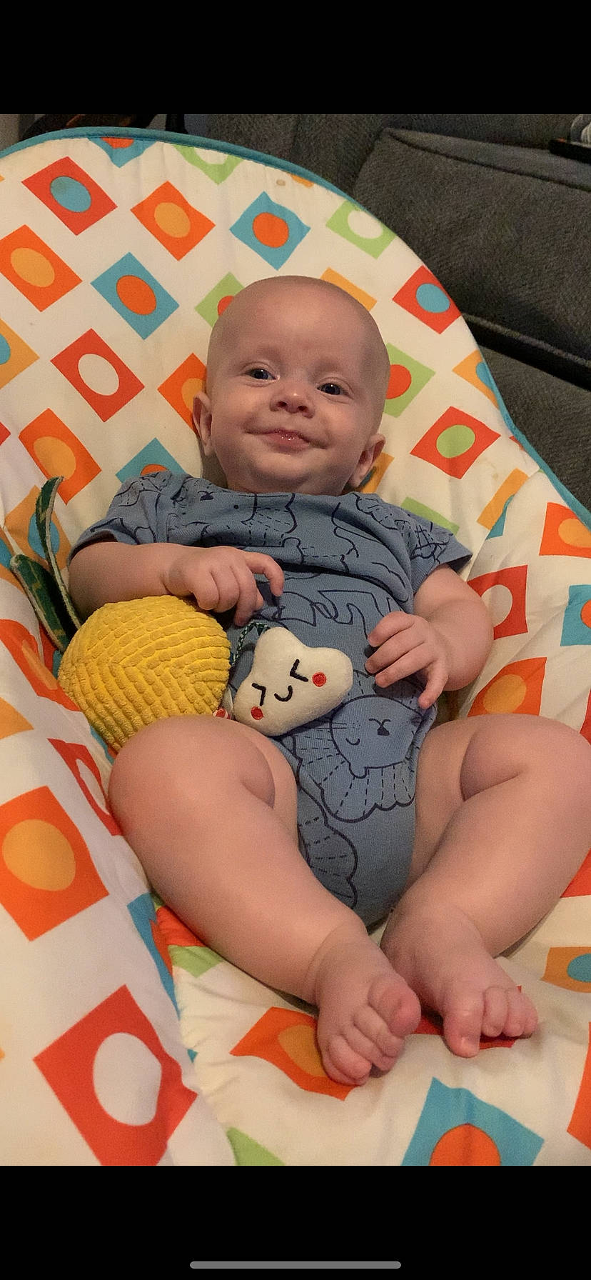 Oliver And Everett is registered to the contest to win money with this photo: abdomen, baby, cheek, comfort, face, facial_expression, finger, hand, happy, joy, lap, leg, leisure, linens, person, product, skin, smile, stomach, textile