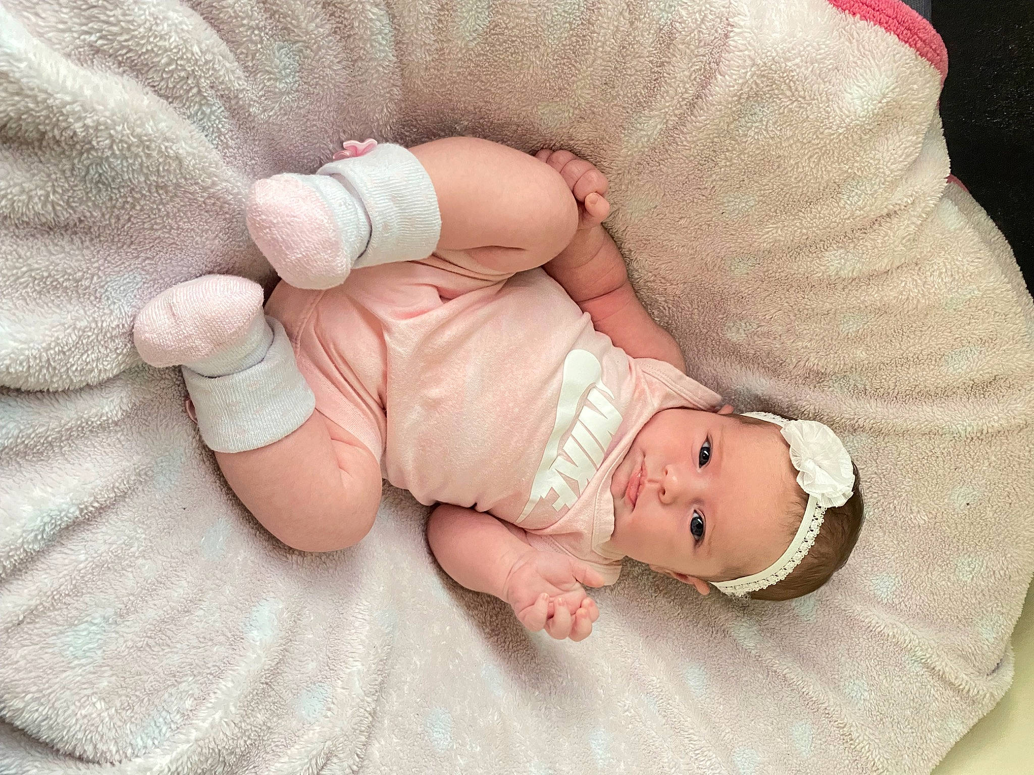 Ava joined the competition — help win amazing prizes! arm, baby, baby_products, baby_sleeping, baby_toddler_clothing, child, comfort, finger, gesture, hand, human_body, leg, nail, pattern, person, pink, skin, sleeve, textile, thumb