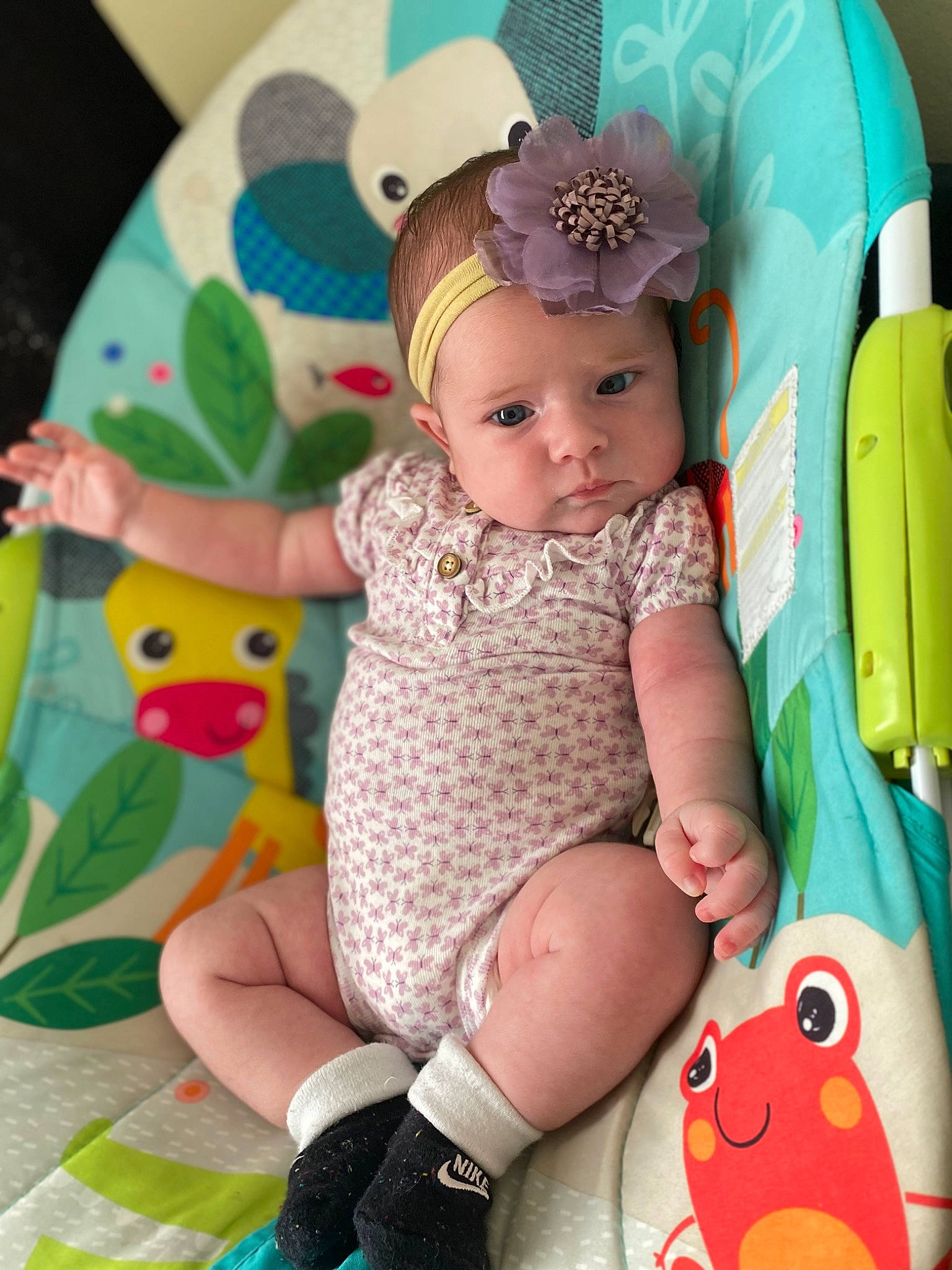 Ava joined the competition — help win amazing prizes! arm, baby, baby_products, baby_toddler_clothing, cheek, child, dress, facial_expression, fun, head, headwear, iris, pattern, person, pink, product, purple, skin, sleeve, sock