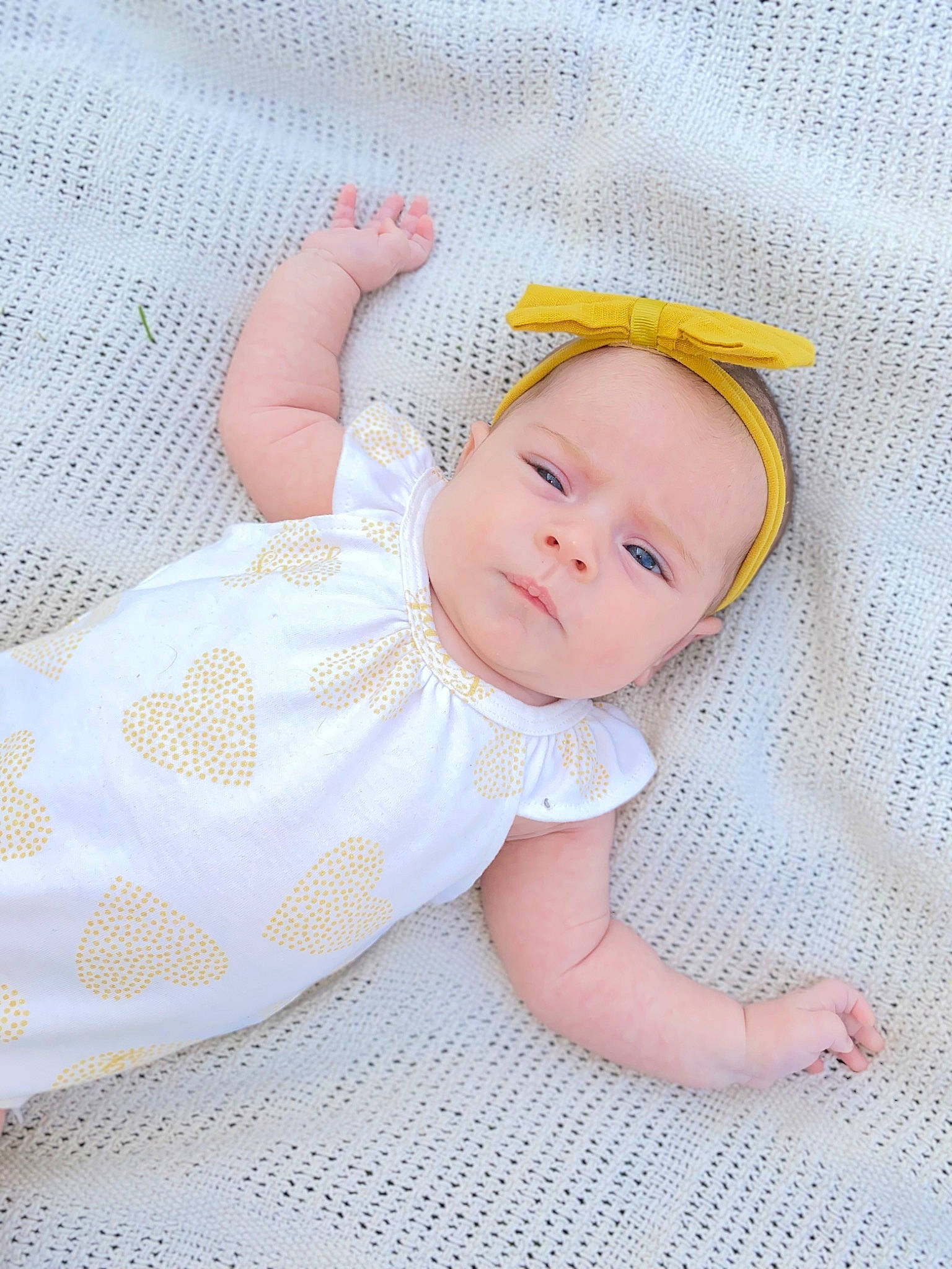 Ava joined the competition — help win amazing prizes! baby, baby_products, baby_sleeping, baby_toddler_clothing, cheek, child, comfort, fashion_accessory, grass, linens, pattern, person, pink, sitting, skin, sleep, sleeve, toddler, wood, wool