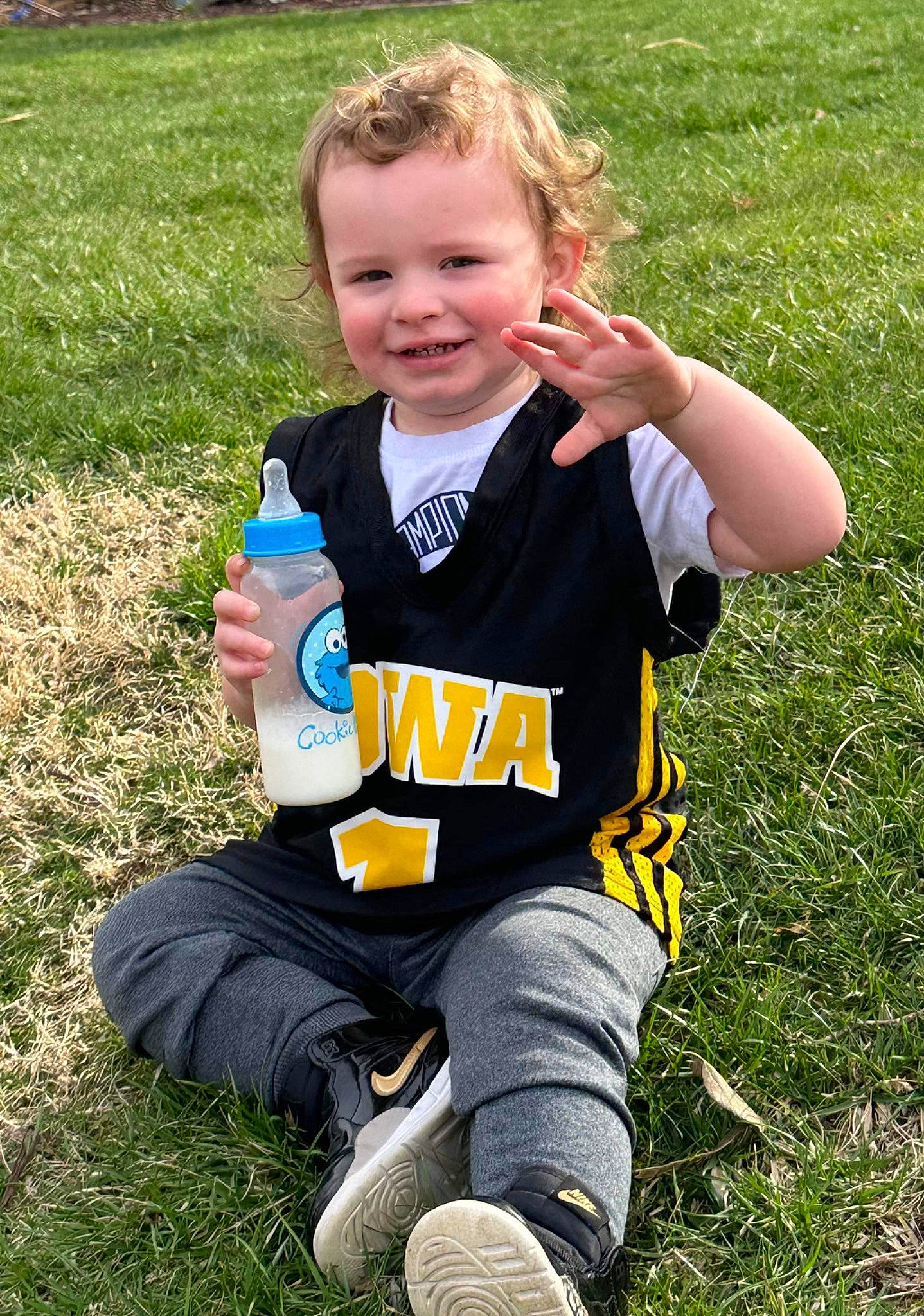 Zayvier joined the competition — help win amazing prizes! baby_toddler_clothing, child, electric_blue, face, finger, fun, grass, happy, head, joy, lawn, outdoor_recreation, people_in_nature, person, personal_protective_equipment, plant, recreation, running, sitting, smile