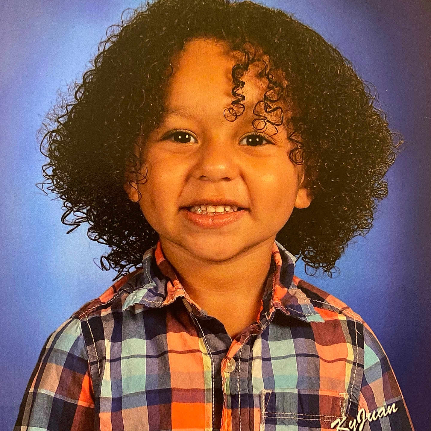 Kyjuan is registered to the contest to win money with this photo: blackhair, blouse, bodypart, clothing, curlyhair, dimples, face, hair, happy, head, laughing, mouth, neck, person, photography, portrait, shirt, shoulder, smile, teeth