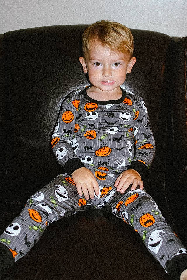 Layne joined the competition — help win amazing prizes! arm, baby_toddler_clothing, carmine, chair, child, comfort, couch, fun, gadget, human_leg, knee, lap, pattern, person, play, sitting, sleeve, sock, t_shirt, thigh