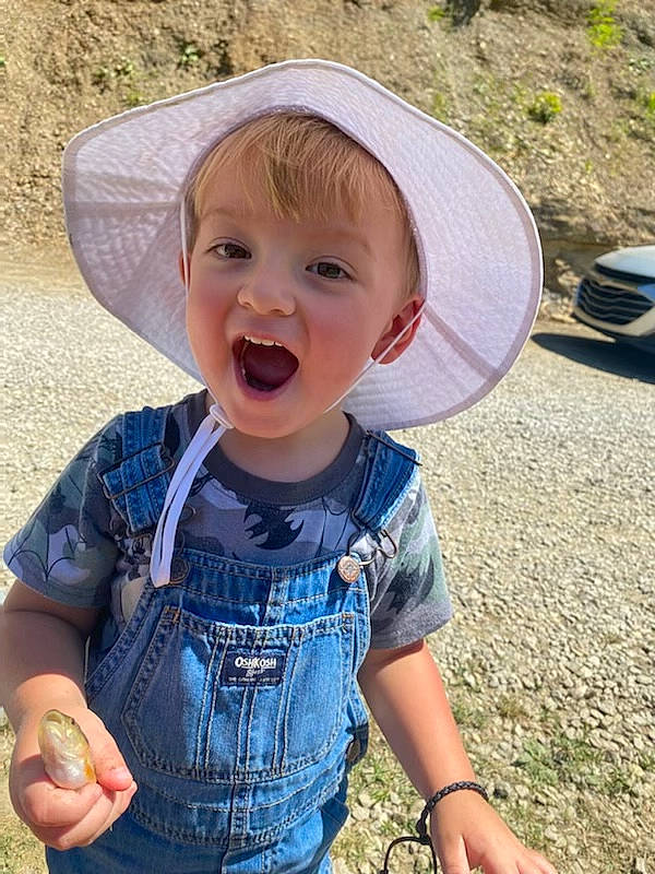 Layne joined the competition — help win amazing prizes! baby_toddler_clothing, cap, child, cool, costume_hat, denim, electric_blue, facial_expression, fun, grass, happy, hat, people, person, skin, sleeve, smile, summer, sun_hat, t_shirt