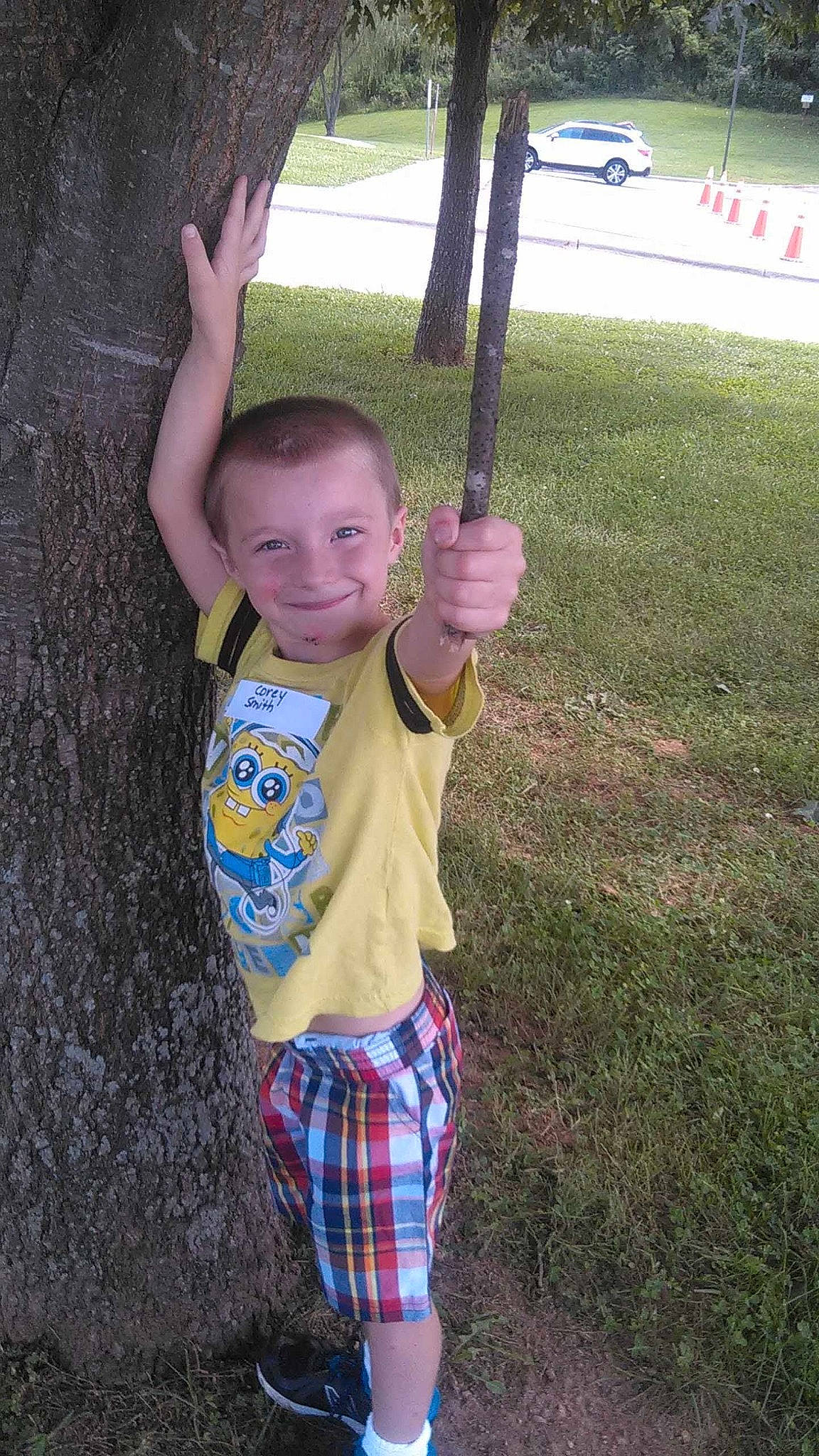 Corey joined the competition — help win amazing prizes! child, cool, fun, gesture, grass, happy, head, joy, leisure, pattern, person, plaid, plant, sleeve, smile, soil, swing, t_shirt, tartan, thumb