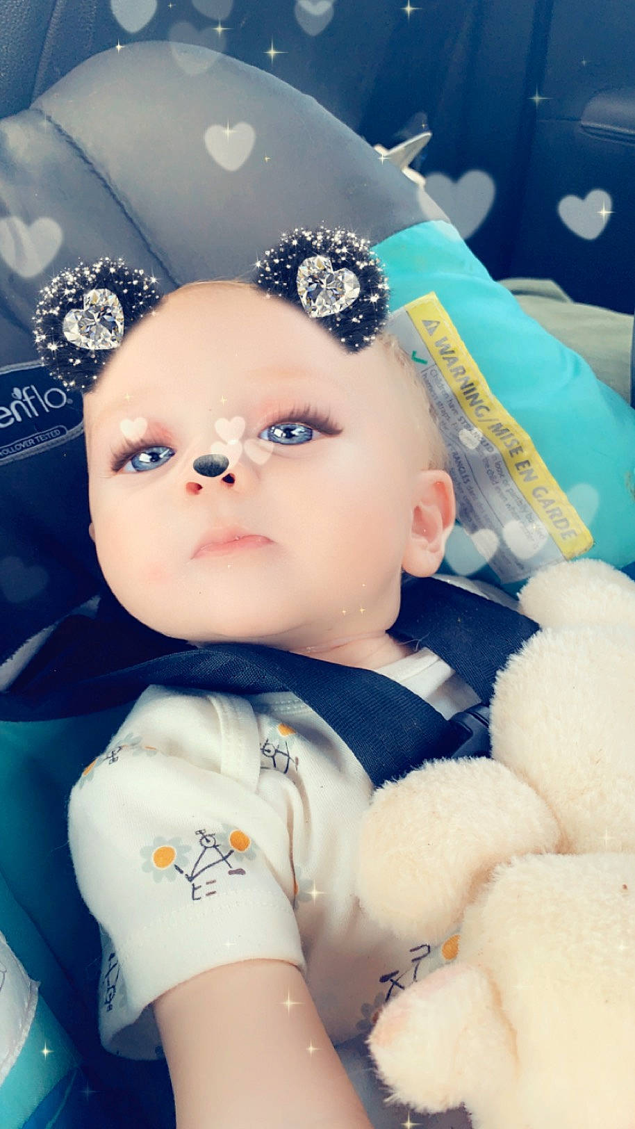 Bulma is registered to the contest to win money with this photo: baby, baby_products, baby_toddler_clothing, cheek, child, electric_blue, eyebrow, eyelash, fashion_accessory, flash_photography, fun, hair_accessory, happy, headpiece, iris, pattern, person, portrait_photography, skin, toddler