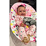 Bella joined the competition — help win amazing prizes! baby, baby_chair, blanket, child, colorful, cozy, curly_hair, cute, footwear, happy, indoor, infant, minnie_mouse, patterned_fabric, person, pink_pajamas, polka_dots, seated, smiling, soft_toy