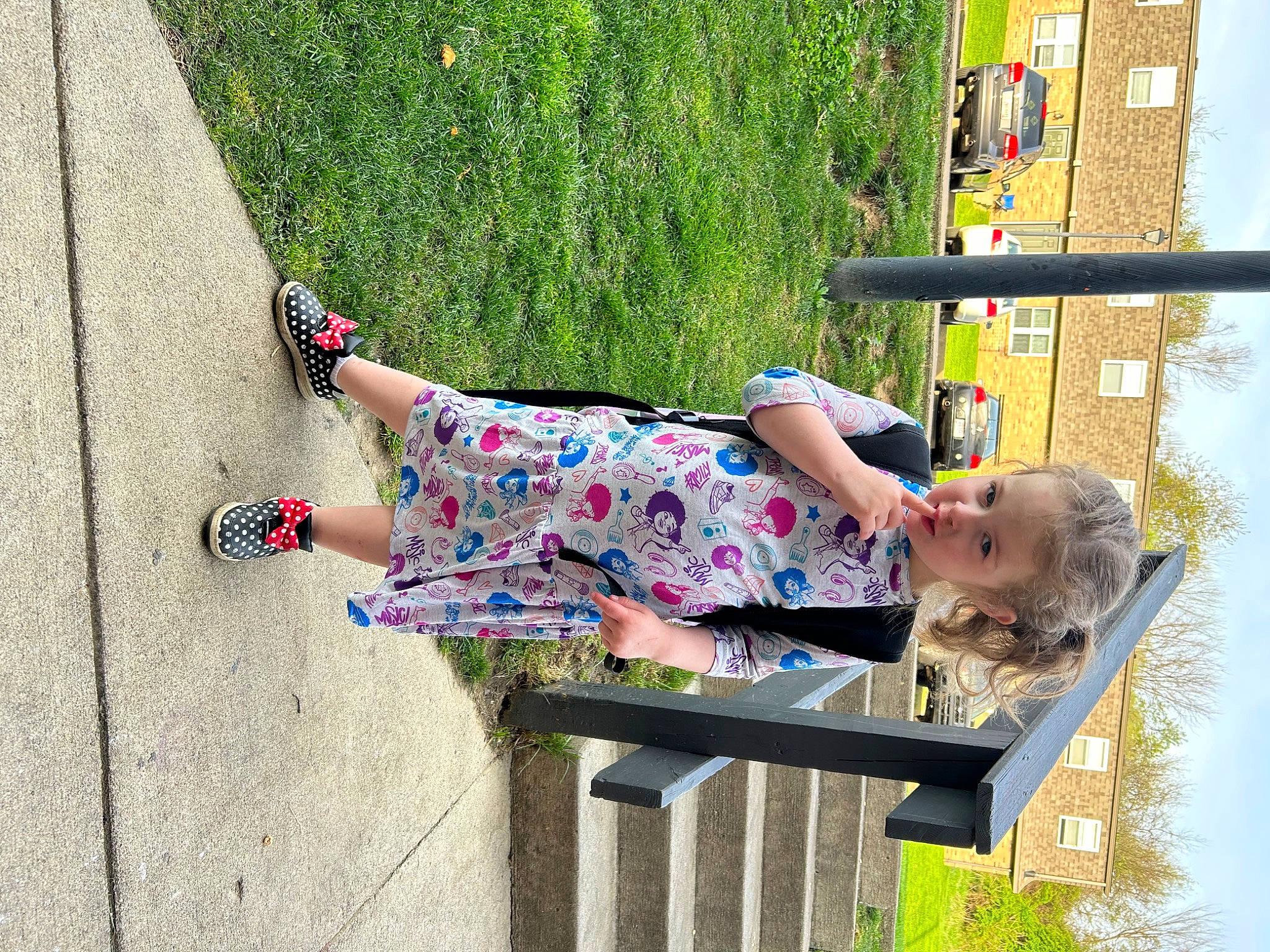 Dorothy is registered to the contest to win money with this photo: baby_toddler_clothing, child, concrete, day_dress, fun, grass, happy, human_leg, leisure, line, magenta, pattern, people_in_nature, person, plant, recreation, smile, thigh, toddler, tree