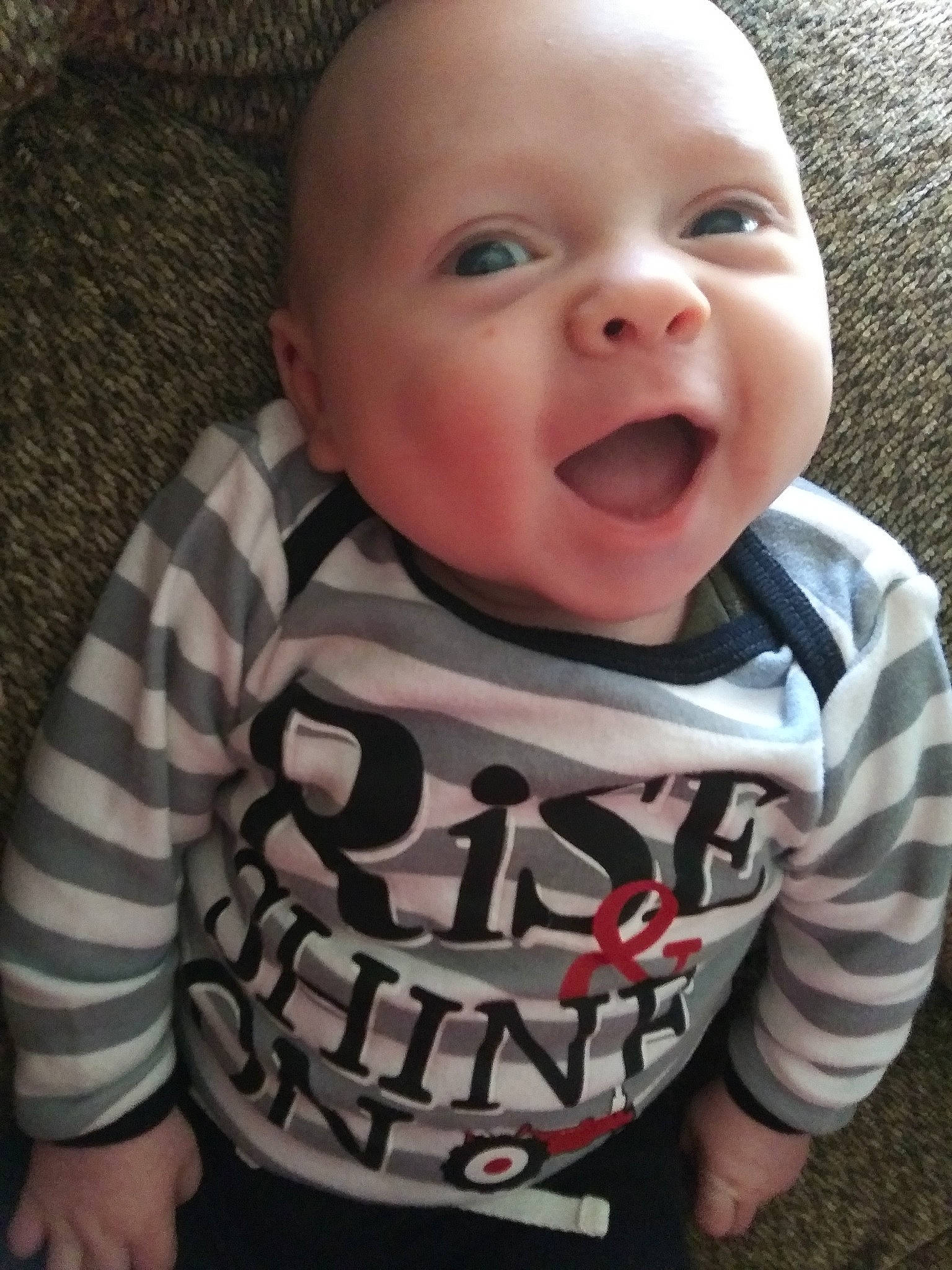 Wheeler James is registered to the contest to win money with this photo: boy, cheek, child, chin, cool, day, emotion, eye, face, facial_expression, head, infant, laughter, mouth, nose, organ, person, product, skin, smile