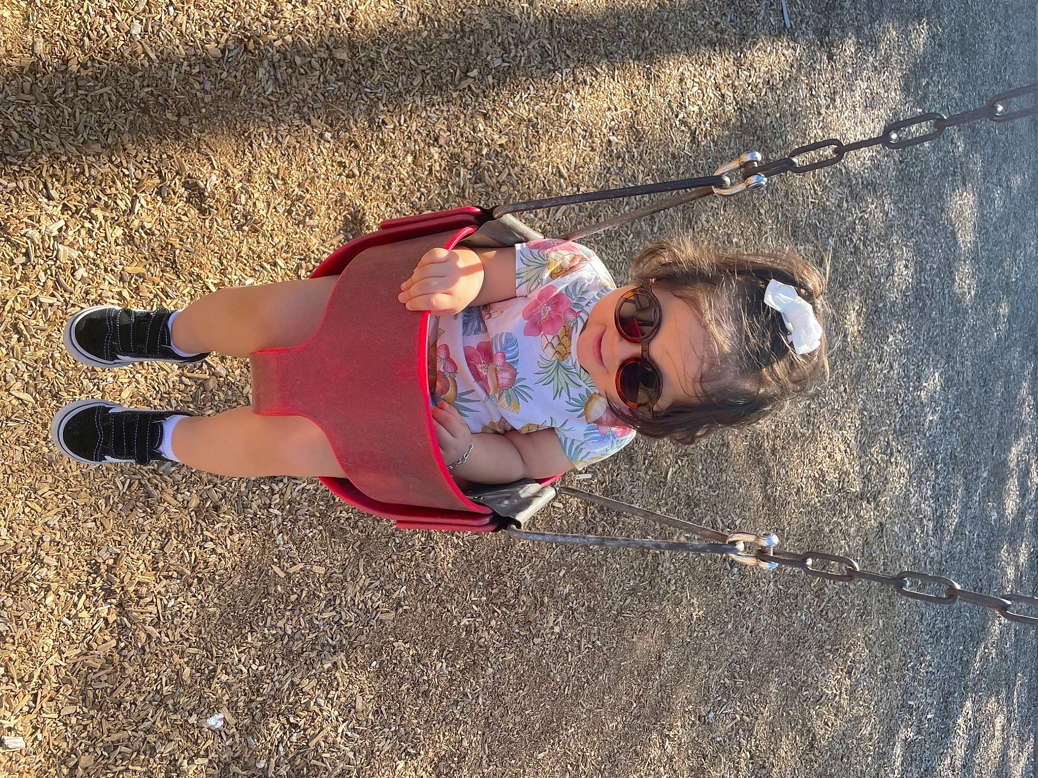 Alina is registered to the contest to win money with this photo: asphalt, eyewear, fun, grass, happy, human_leg, landscape, leg, leisure, people_in_nature, person, recreation, road_surface, sand, shadow, sidewalk, soil, sunglasses, thigh, toddler