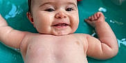 Elyna participe au concours pour gagner de l'argent avec cette photo : baby, smiling, water, pool, toy, child, play, happy, skin, face, arm, splash, infant, summer, cute, fun, wet, closeup, background, floating