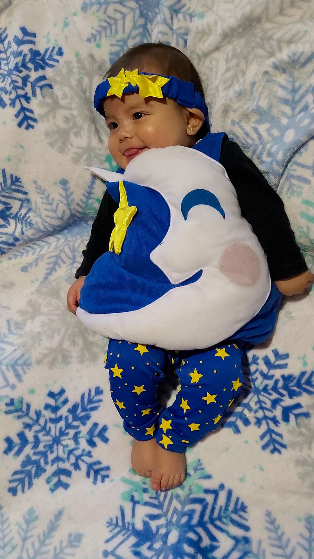 Alicia joined the competition — help win amazing prizes! baby_toddler_clothing, blue, child, costume, electric_blue, eye, face, fun, glasses, goggles, happy, head, headwear, human_leg, pattern, person, sitting, sleeve, textile, thigh