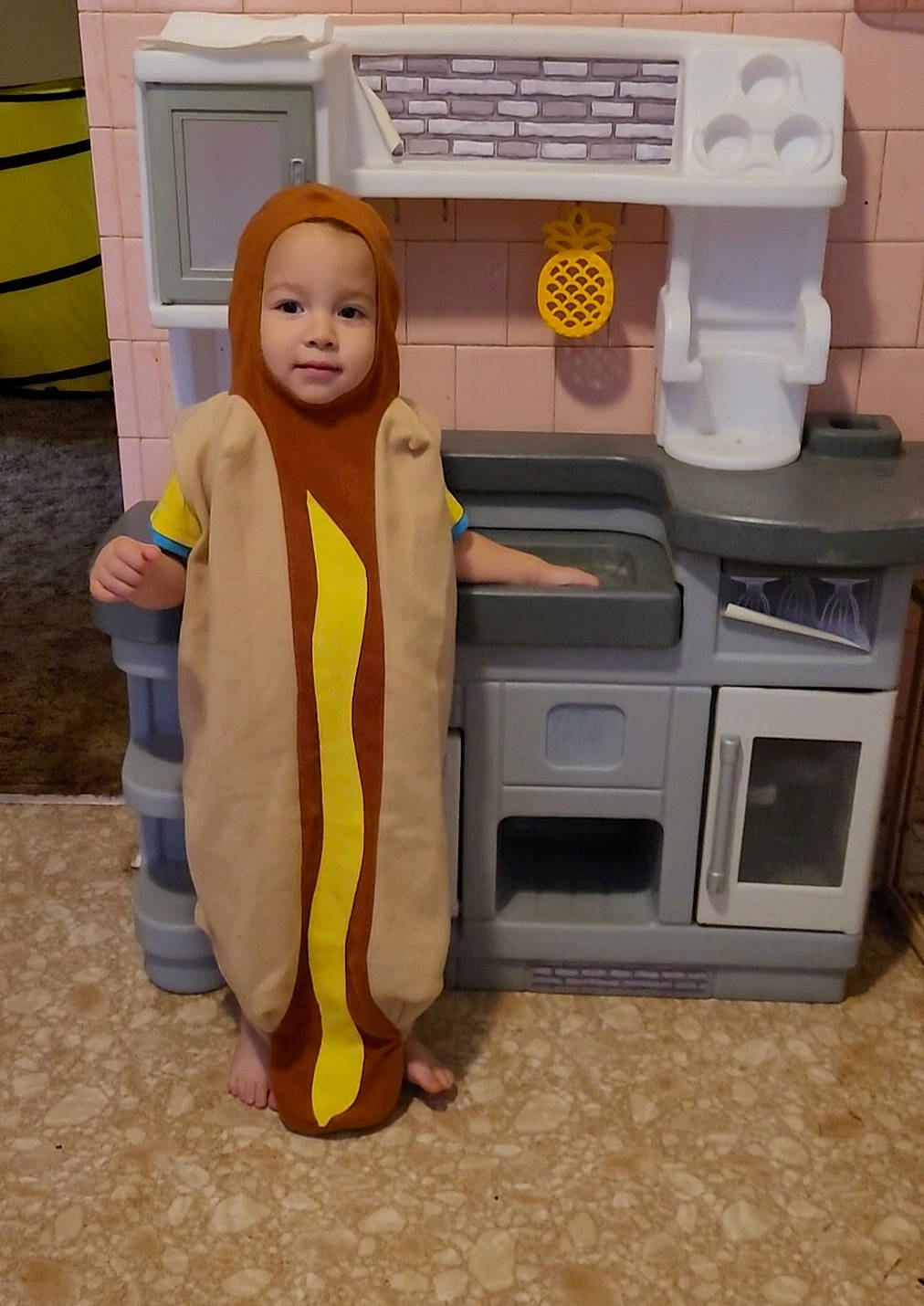 Levi joined the competition — help win amazing prizes! cabinetry, chest_of_drawers, child, door, drawer, floor, flooring, gas, home_appliance, kitchen, machine, output_device, person, room, service, toddler