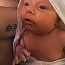 Baylee joined the competition — help win amazing prizes! newborn, baby, infant, child, portrait, face, eyes, hood, blanket, pink, striped, swaddled, sitting, hand, arm, tattoo, adult, cuddling, indoor, close_up