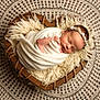 Maya is registered to the contest to win money with this photo: newborn, baby, sleeping, wrapped, blanket, heart_shaped_bowl, wooden_bowl, fur, crocheted_rug, round_rug, floor, indoors, headband, flower_headband, cute, peaceful, portrait, baby_photography, soft_texture, warmth