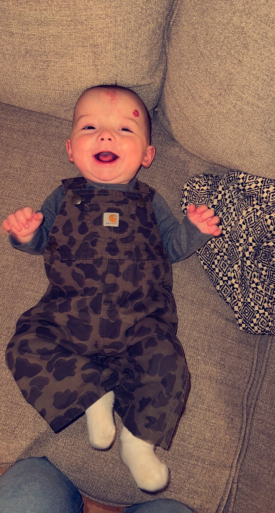 Ledger joined the competition — help win amazing prizes! arm, baby, baby_toddler_clothing, beauty, child, comfort, finger, flooring, joint, linens, military_camouflage, nose, outerwear, pattern, person, sitting, skin, sleeve, smile, textile