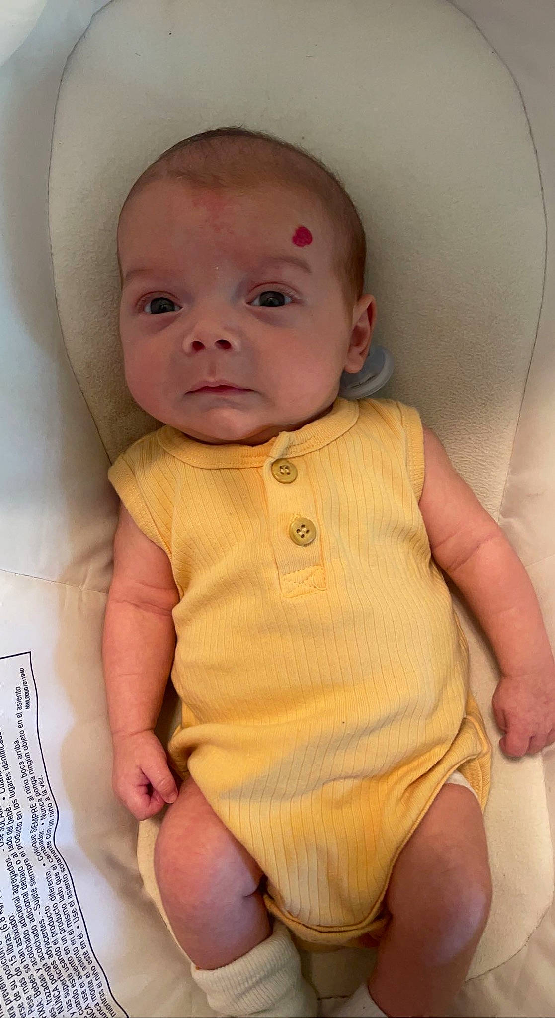 Ledger is registered to the contest to win money with this photo: baby, baby_toddler_clothing, cheek, chin, collar, comfort, eye, face, finger, head, iris, lip, neck, nose, person, pink, product, skin, sleeve, stomach
