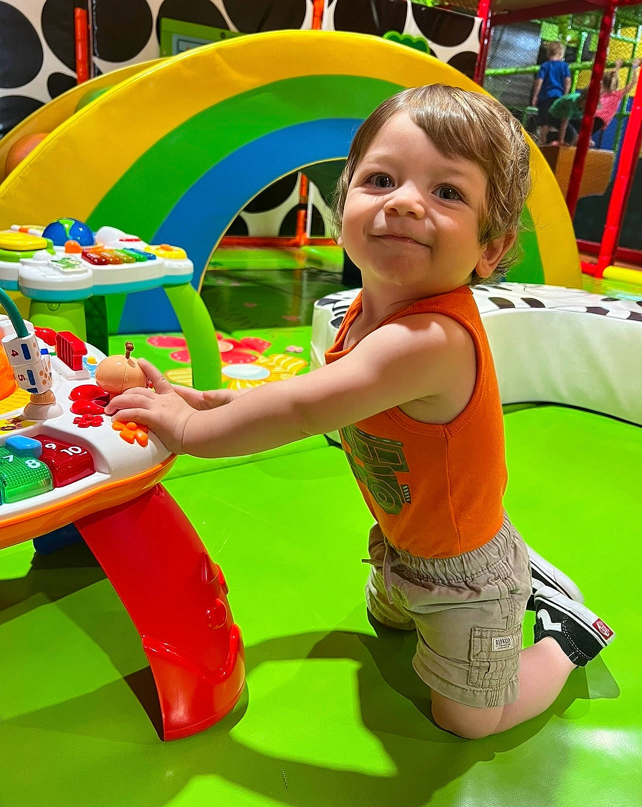 Adam is registered to the contest to win money with this photo: baby_playing_with_toys, baby_toddler_clothing, child, city, fun, games, grass, green, happy, joy, leisure, outdoor_play_equipment, person, play, playground, recreation, shorts, smile, t_shirt, toddler