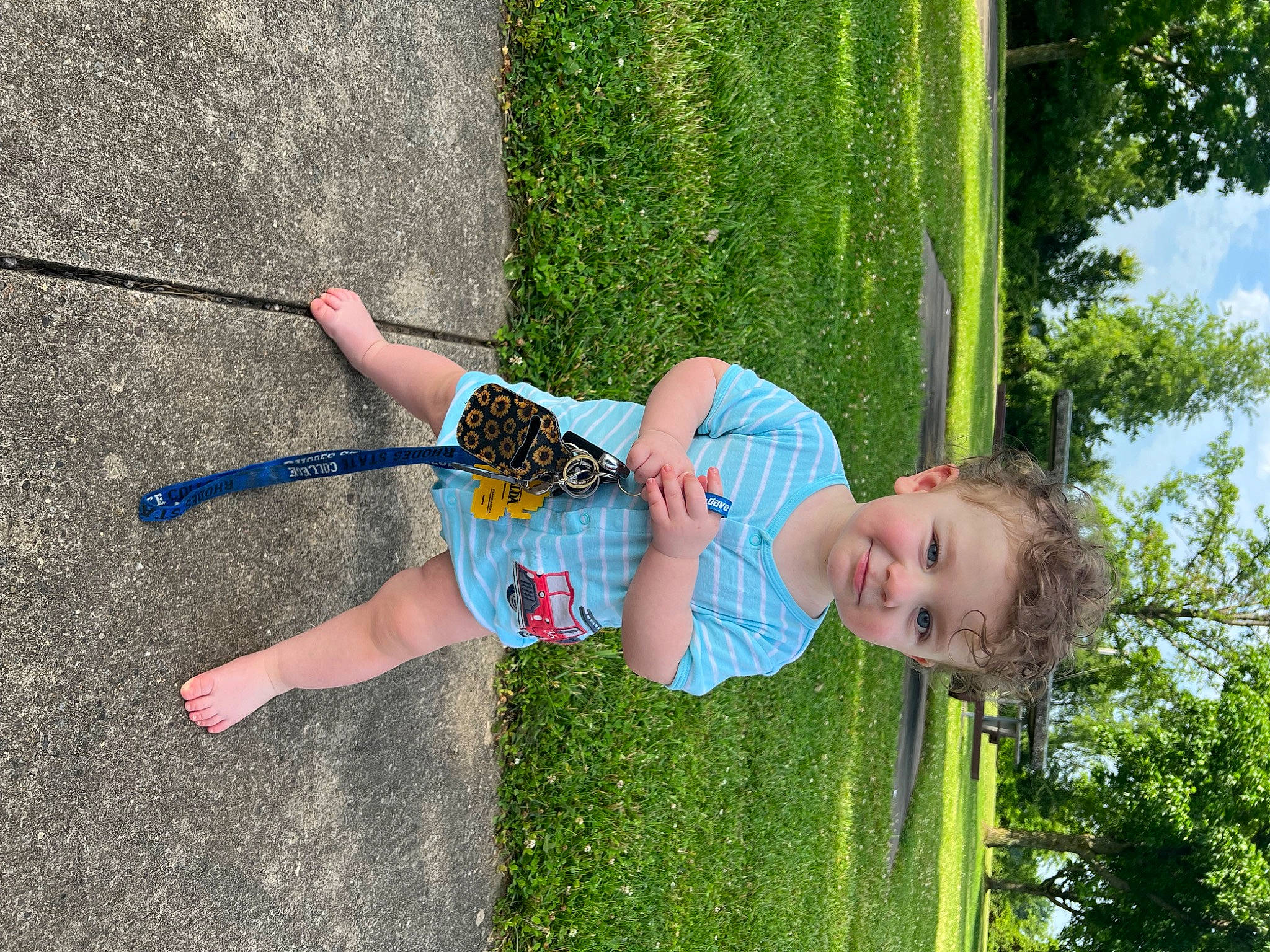 Kashton is registered to the contest to win money with this photo: balance, electric_blue, fun, grass, grass_family, happy, joy, lawn, leisure, nature, outdoor_play_equipment, people_in_nature, person, plant, public_space, recreation, sky, smile, summer, swing