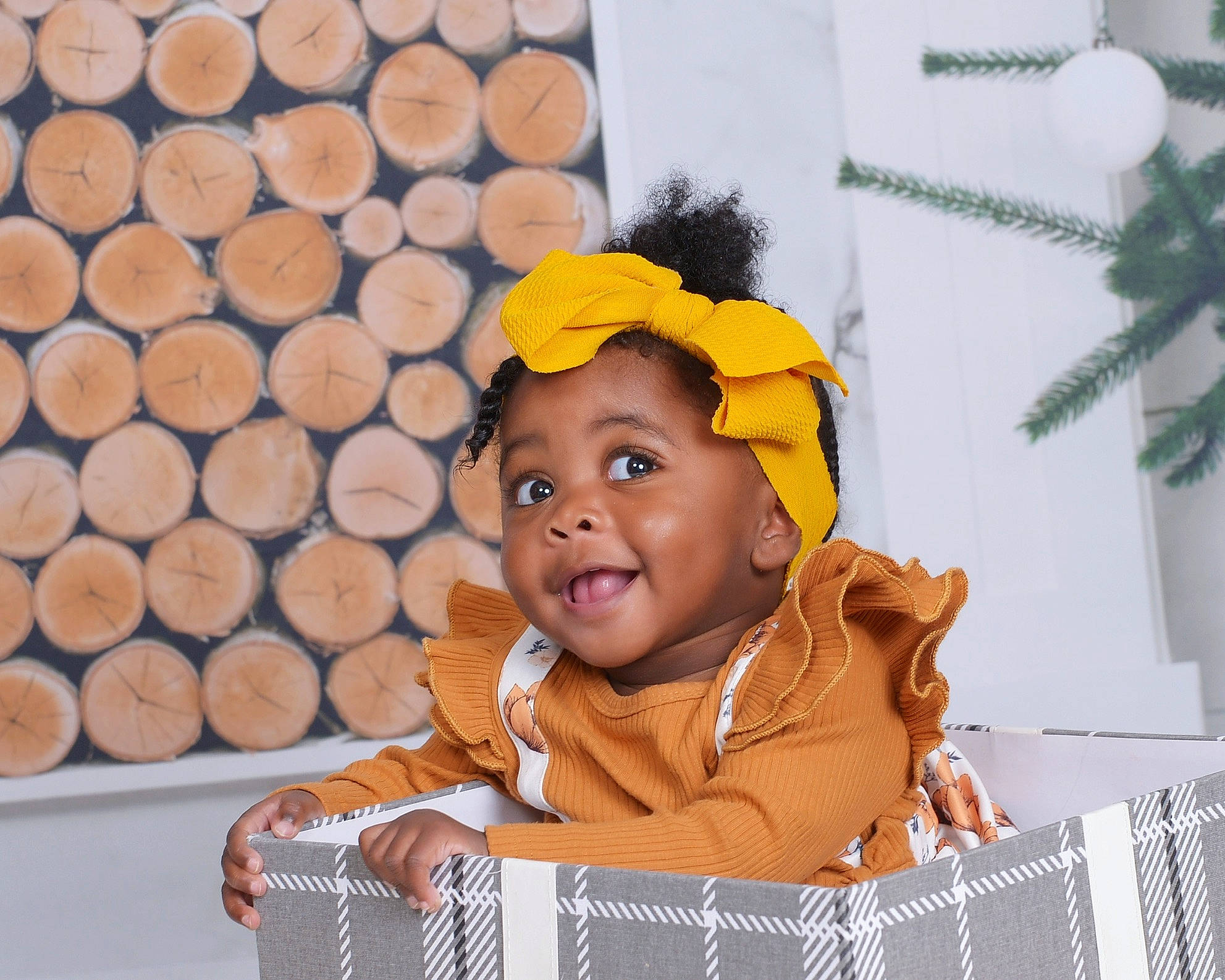 Ayva joined the competition — help win amazing prizes! baby, baby_toddler_clothing, chair, child, event, flooring, fun, fur, happy, hoodie, jacket, leisure, orange, pattern, person, recreation, room, sitting, sleeve, smile