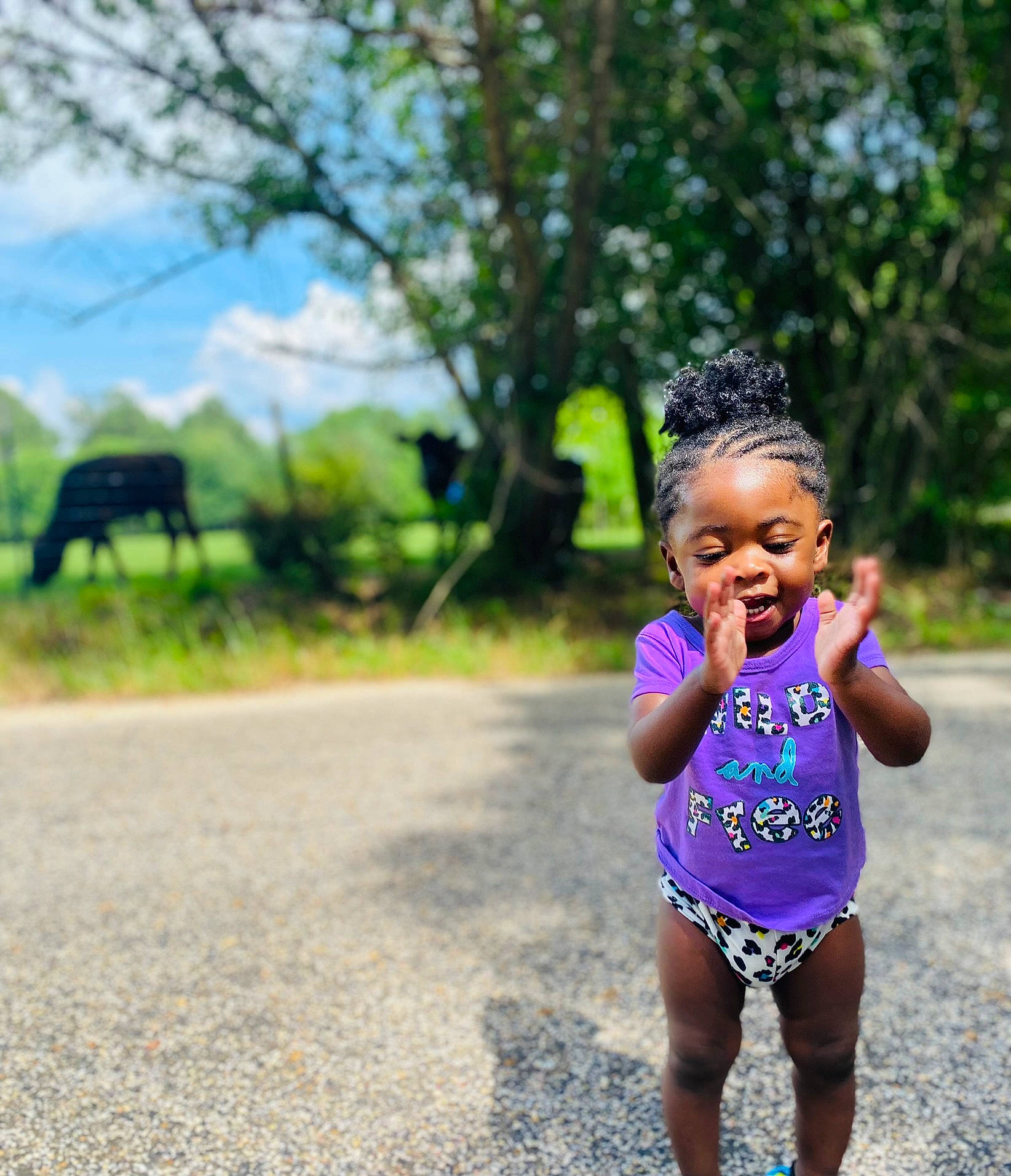 Ayva is registered to the contest to win money with this photo: asphalt, baby, baby_toddler_clothing, child, electric_blue, fashion_accessory, fun, grass, happy, headband, leisure, people_in_nature, person, plant, recreation, road, smile, toddler, tree, waist