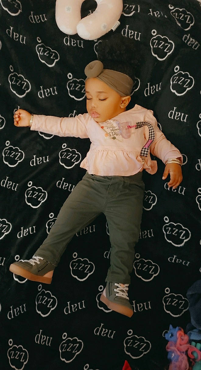 Londynn is registered to the contest to win money with this photo: baseball_cap, blackboard, cap, chalk, child, design, event, fashion_design, flooring, font, formal_wear, gesture, happy, pattern, person, photography, product, sandal, sleeve, toddler