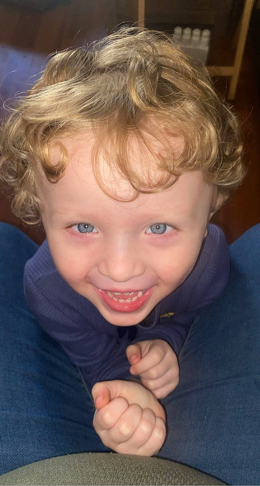 Elijah is registered to the contest to win money with this photo: arm, cheek, chin, eye, eyebrow, eyelash, face, facial_expression, forehead, hair, hairstyle, hand, head, joy, lip, mouth, nose, organ, person, skin