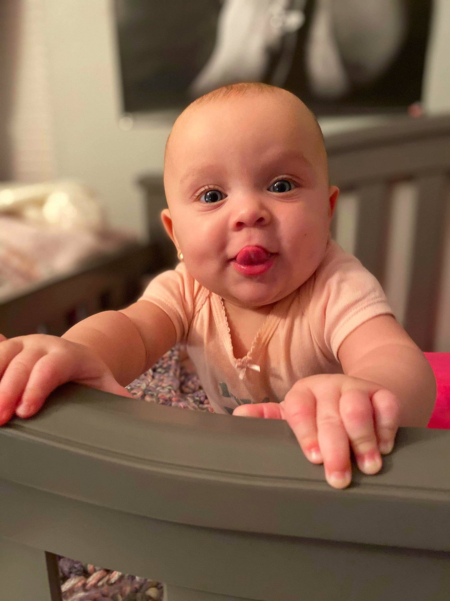 Gabriella joined the competition — help win amazing prizes! baby, baby_grabbing_for_something, baby_products, baby_safety, baby_toddler_clothing, cheek, child, eyelash, finger, hand, lip, nail, nose, person, pink, sitting, skin, thumb, toddler, tongue