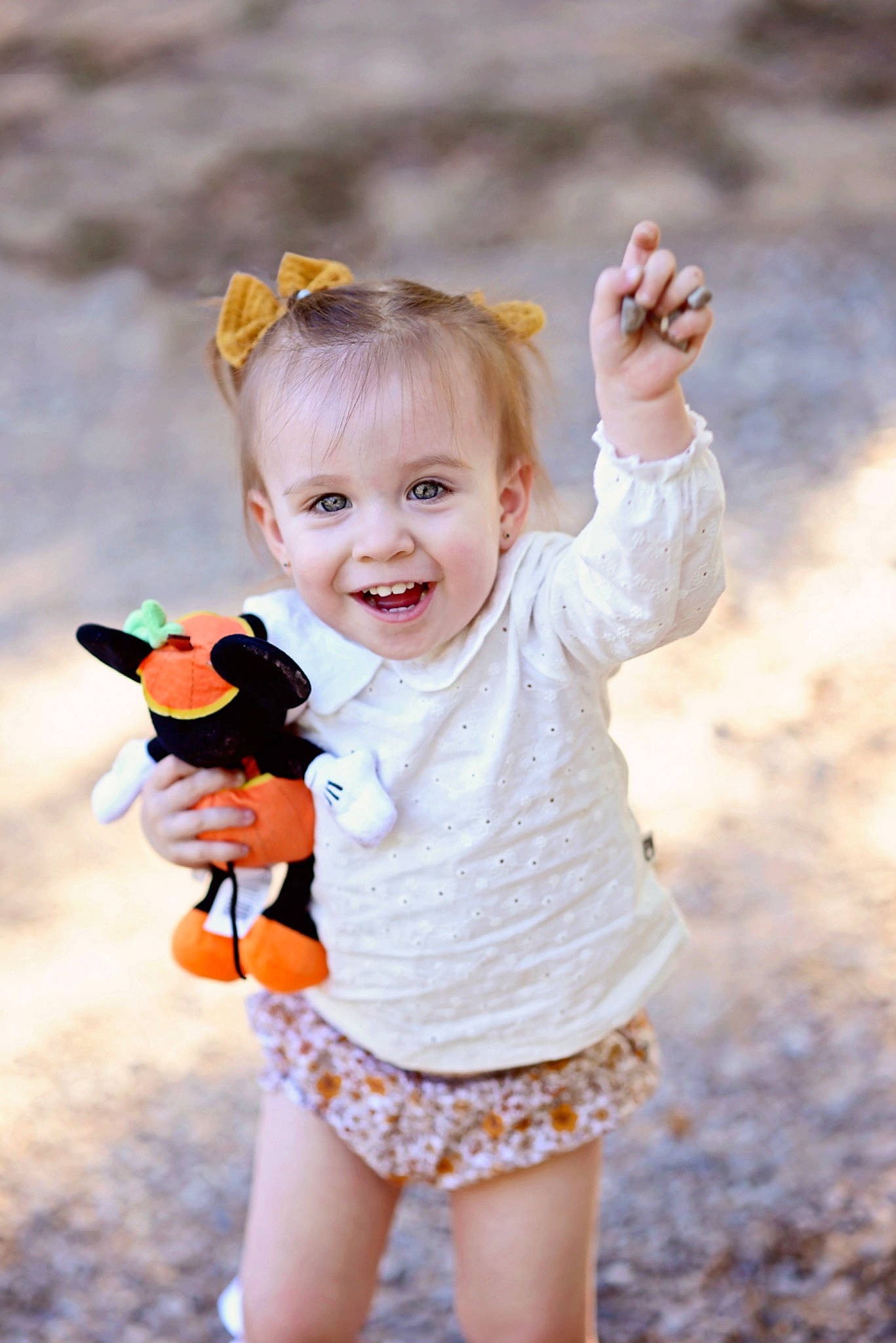 Stella is registered to the contest to win money with this photo: baby_toddler_clothing, eye, fawn, finger, flash_photography, gesture, hair, hand, happy, head, iris, joy, people_in_nature, person, photograph, pink, plant, skin, smile, summer