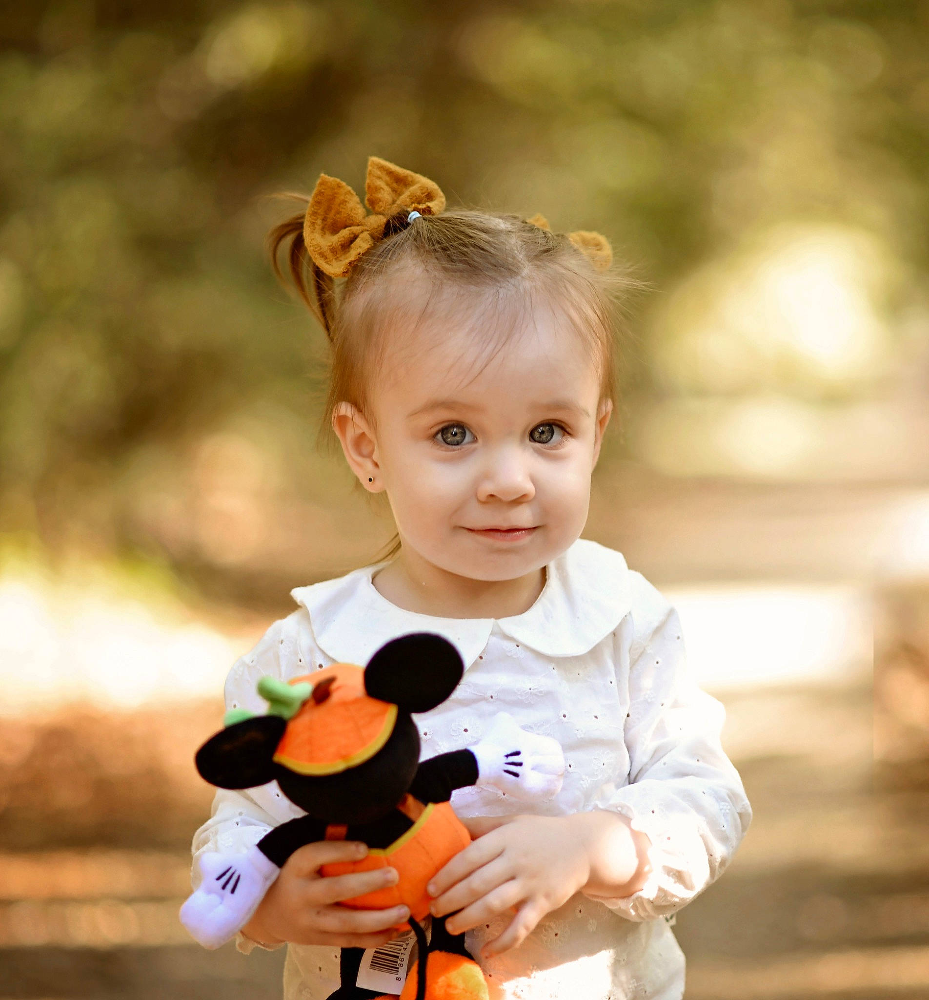 Stella is registered to the contest to win money with this photo: baby, baby_toddler_clothing, beauty, child, flash_photography, grass, happy, head, joy, pattern, people_in_nature, person, plant, portrait_photography, sitting, sleeve, smile, t_shirt, teddy_bear, toddler