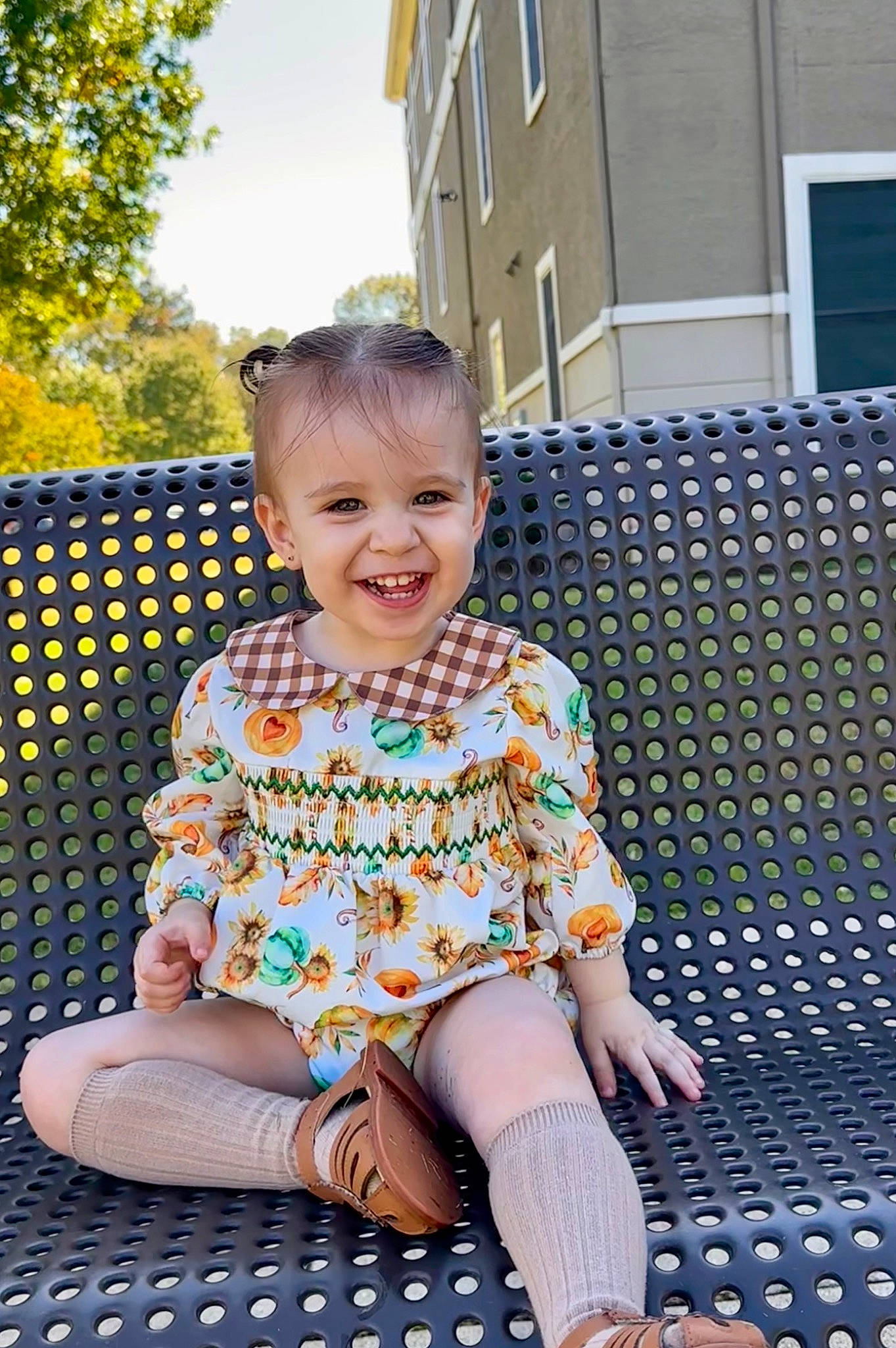 Stella joined the competition — help win amazing prizes! baby_toddler_clothing, child, fun, grass, happy, human_leg, joy, leisure, pattern, person, purple, sandal, sitting, sky, sleeve, smile, summer, t_shirt, toddler, tree