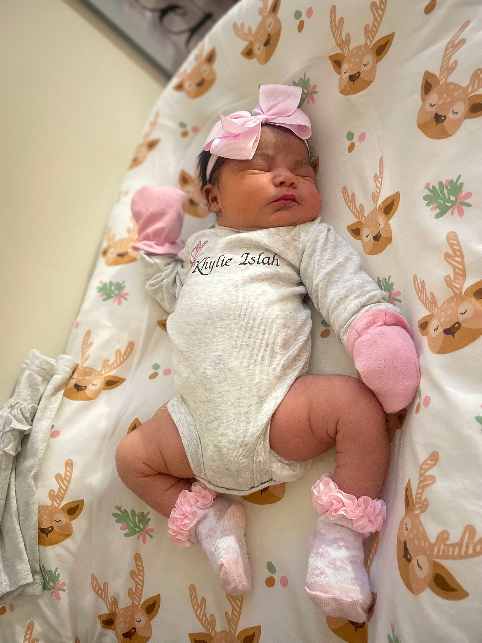 Khylie is registered to the contest to win money with this photo: baby, baby_products, baby_safety, baby_sleeping, baby_toddler_clothing, bedding, cap, child, comfort, linens, magenta, pattern, peach, person, pink, product, room, skin, sleeve, thigh