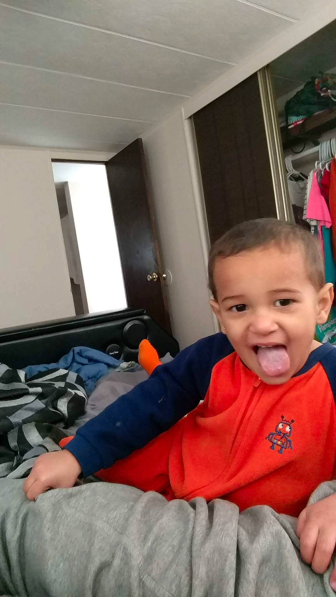 Xavier joined the competition — help win amazing prizes! arm, baby, child, electronic_device, joy, leg, person, play, room, sitting, technology, toddler