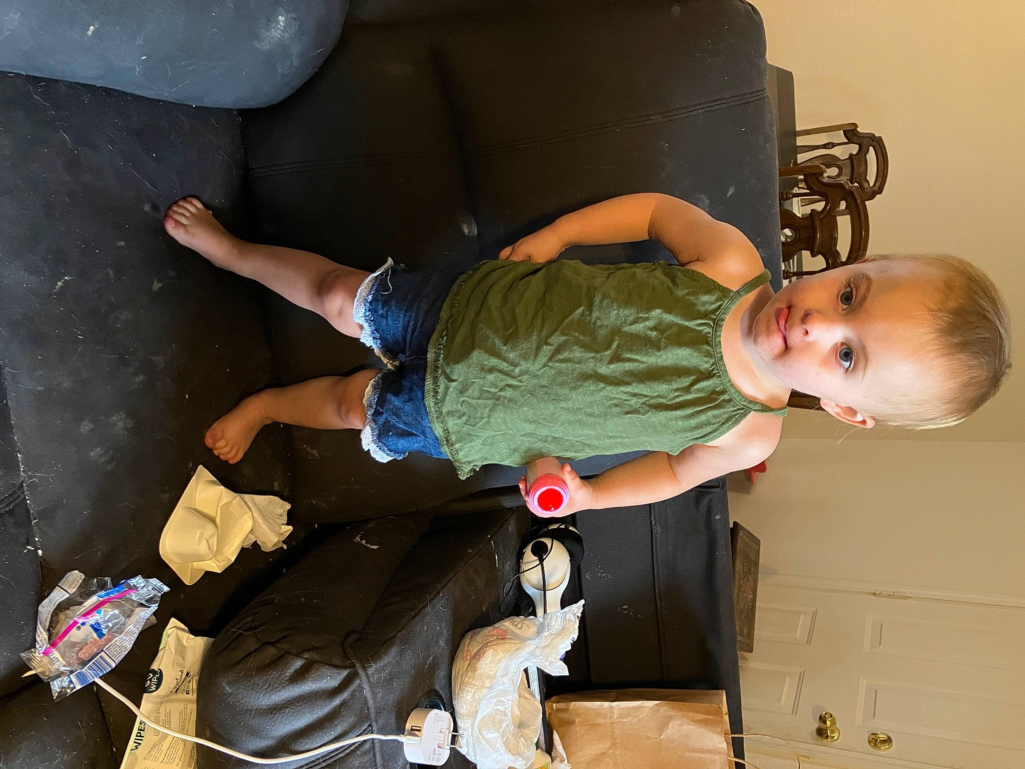 Aerilyn is registered to the contest to win money with this photo: baby, baby_products, baby_toddler_clothing, child, comfort, elbow, flash_photography, fun, human_leg, joint, knee, leg, person, room, sitting, sneakers, t_shirt, thigh, toddler
