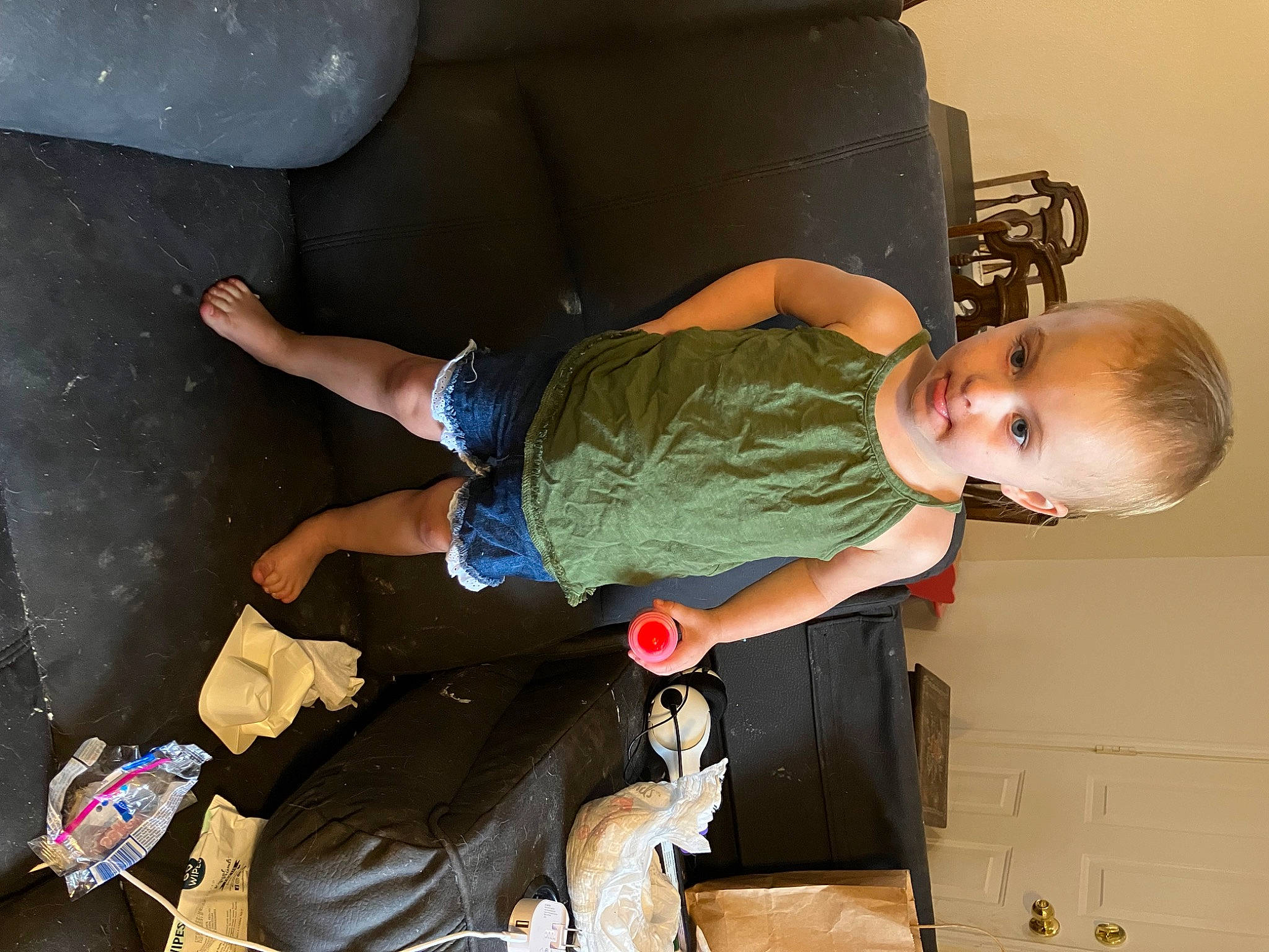 Aerilyn is registered to the contest to win money with this photo: baby, baby_products, baby_toddler_clothing, child, comfort, elbow, fun, human_leg, joint, knee, lap, person, room, sitting, thigh, toddler
