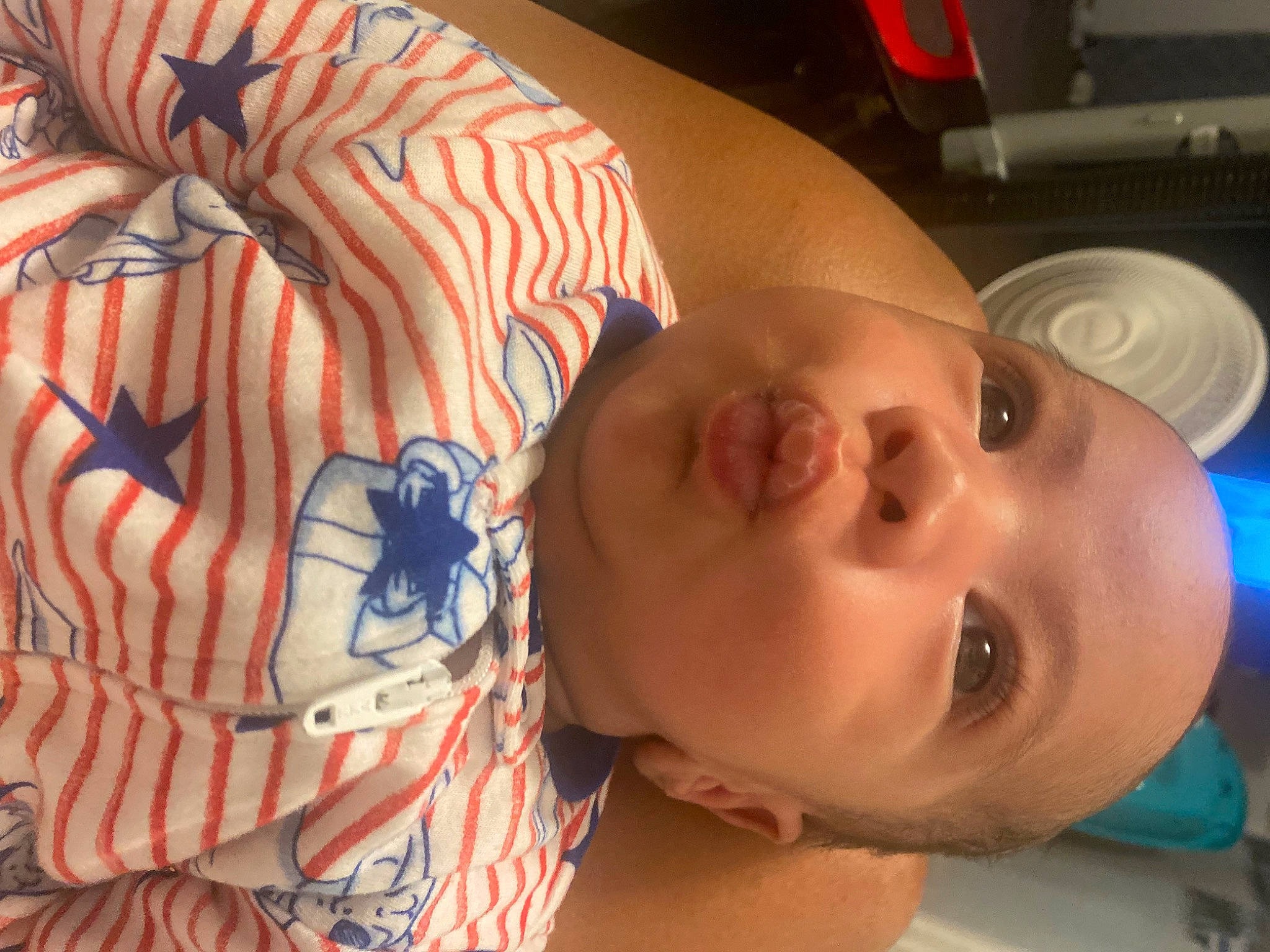 King is registered to the contest to win money with this photo: baby, cheek, chin, cool, ear, eye, eyebrow, eyelash, finger, forehead, hairstyle, head, human_body, iris, mammal, mouth, neck, nose, person, skin