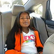 Harmony is registered to the contest to win money with this photo: accessories, adult, car, crying, cushion, driving, face, female, glasses, happy, head, headrest, homedecor, person, sad, sitting, smile, transportation, vehicle, woman