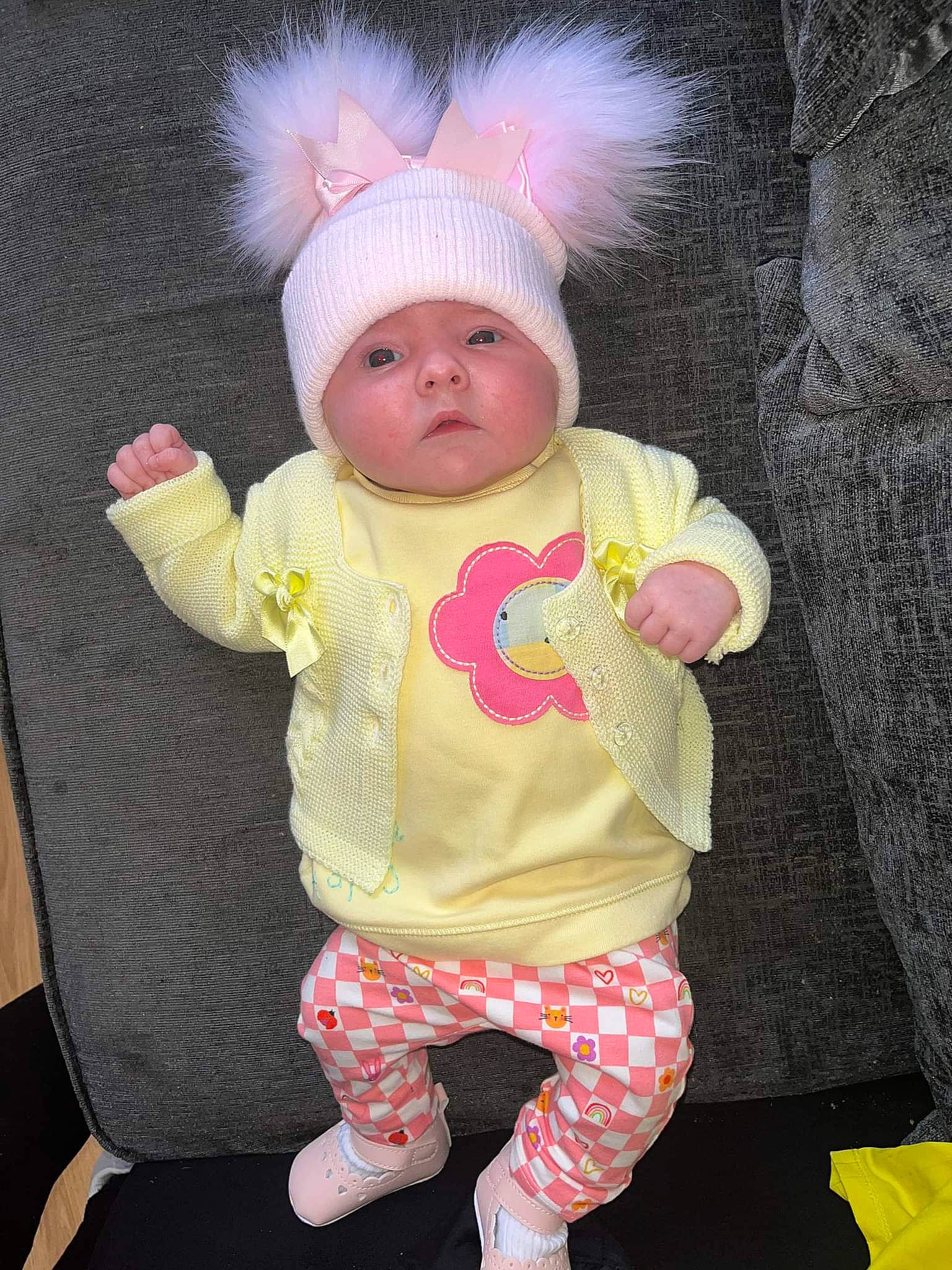 Delilah is registered to the contest to win money with this photo: art, baby, baby_products, baby_toddler_clothing, cap, cheek, child, costume, costume_hat, eye, face, fur, hat, head, headwear, human_body, knit_cap, person, pink, skin
