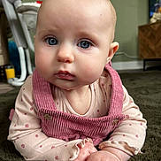 Ada is registered to the contest to win money with this photo: baby, babycrawling, clothing, crawling, face, hair, head, person, photography, portrait, scarf, sitting, sleeve, spitting