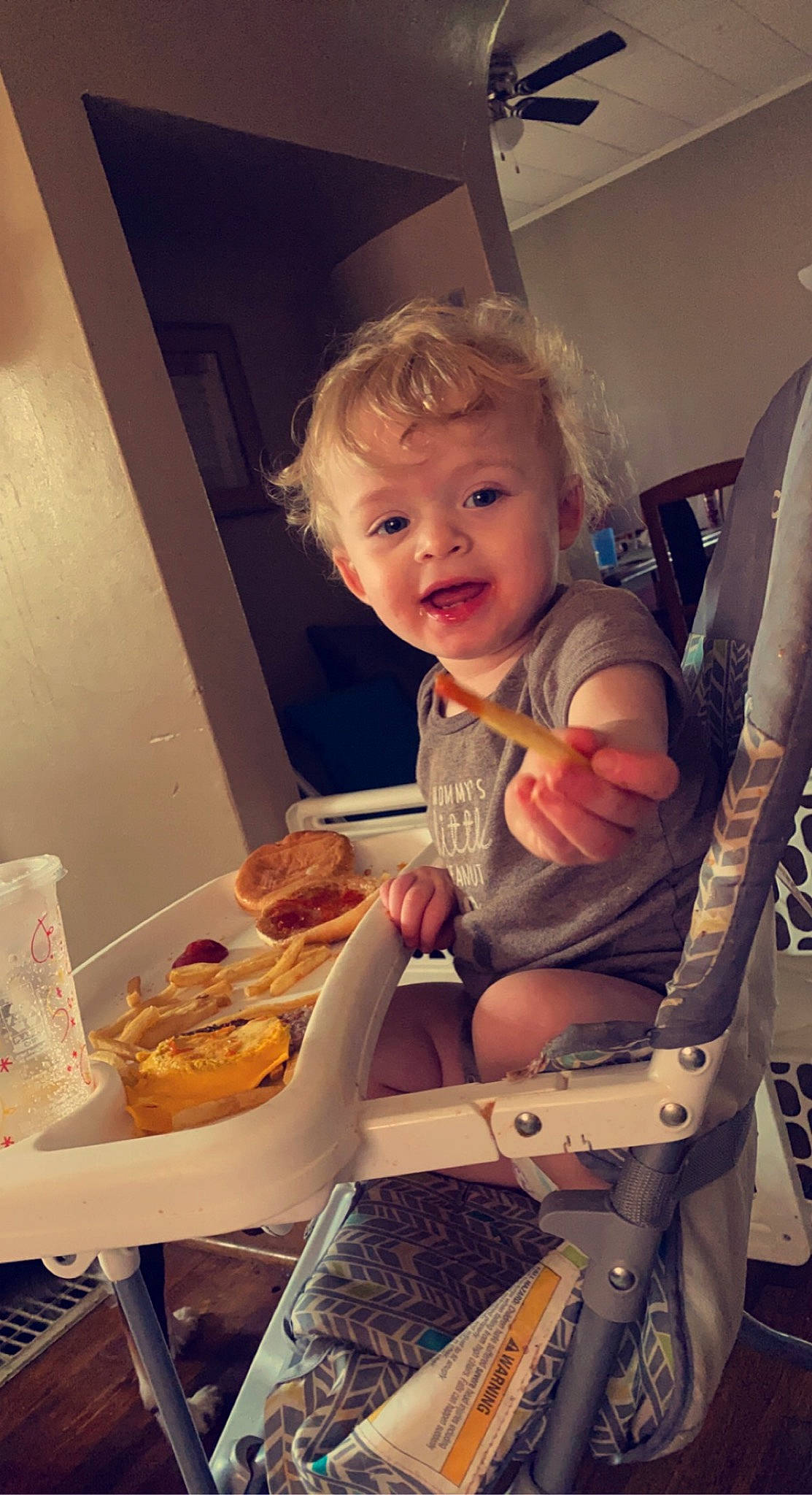 Liam joined the competition — help win amazing prizes! baby, blond, chair, child, comfort_food, cooking, eating, finger_food, food, food_craving, fun, junk_food, person, plate, room, sitting, smile, standing, table, tableware