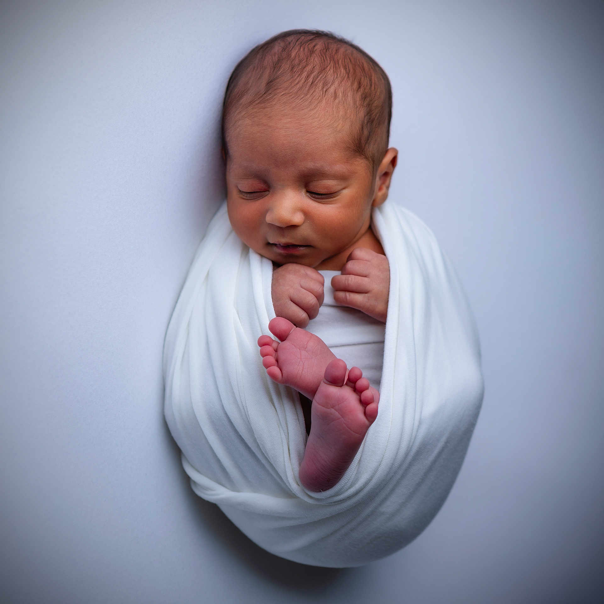 Sai joined the competition — help win amazing prizes! baby, child, closeup, cute, feet, hands, human, infant, minimalist, newborn, newborn_photography, peaceful, portrait, resting, sleeping, soft_light, studio, swaddled, white_blanket, wrapped
