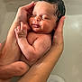 baby, bath, care, child, closed_eyes, cute, hands, human, infant, love, newborn, peaceful, portrait, relaxation, skin, small, smile, tender, water, wet