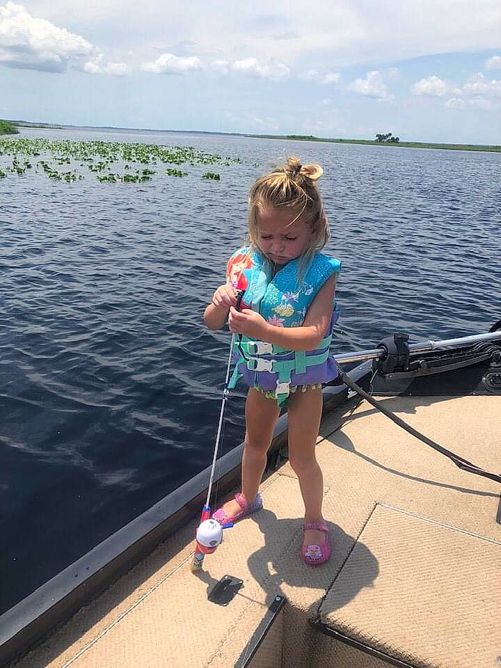 Westlyn is registered to the contest to win money with this photo: boats_and_boating_equipment_and_supplies, child, cloud, electric_blue, fun, lake, leisure, ocean, outdoor_recreation, person, recreation, rope, shorts, sky, toddler, tourism, toy, travel, vacation, vertebrate