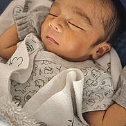 Damien Vincent is registered to the contest to win money with this photo: newborn, baby, sleeping, blanket, mittens, cozy, infant, peaceful, soft, cute, portrait, child, resting, indoors, warm, clothing, closeup, toddler, face, head