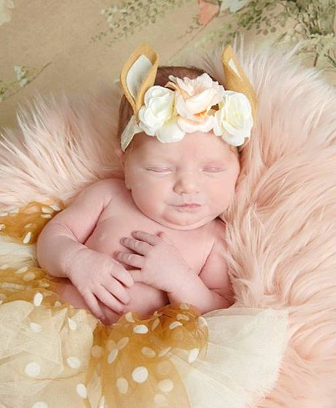 Emberlyn joined the competition — help win amazing prizes! baby, baby_toddler_clothing, child, costume_accessory, costume_hat, embellishment, fashion_accessory, flower, grass, hair_accessory, happy, hat, headband, headgear, headpiece, headwear, jewellery, peach, person, petal