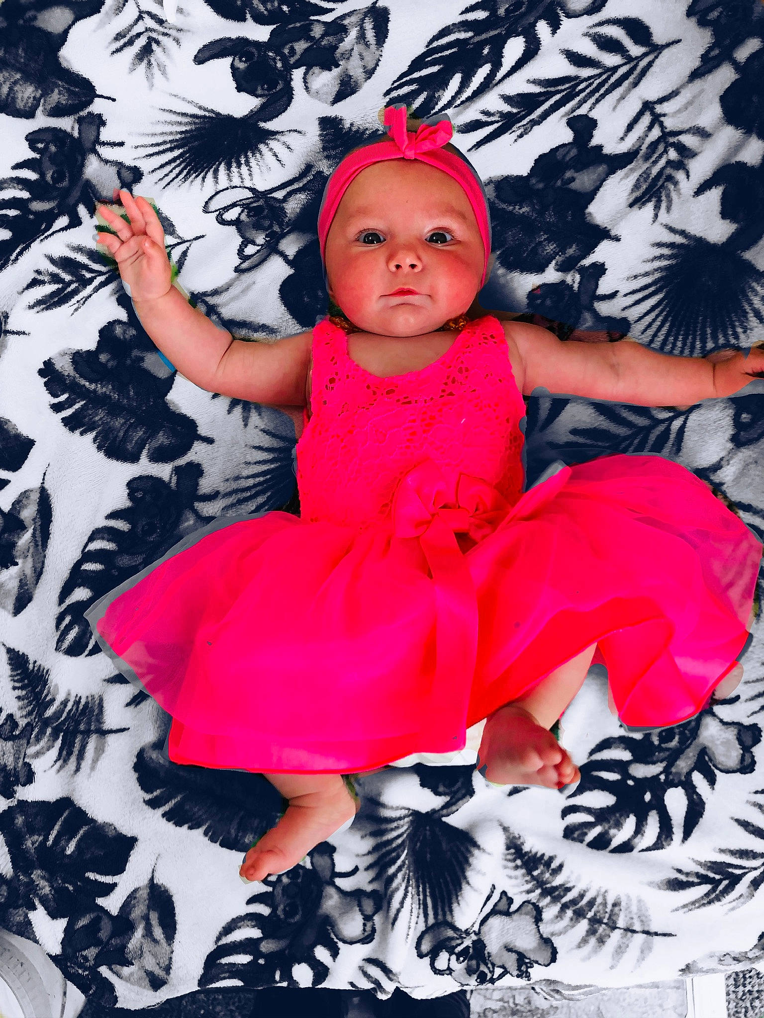 Djulia participe au concours pour gagner de l'argent avec cette photo : baby, baby_toddler_clothing, child, costume_hat, fashion, flash_photography, fun, happy, headpiece, headwear, jewellery, magenta, pattern, person, petal, pink, purple, sitting, sleeve, textile