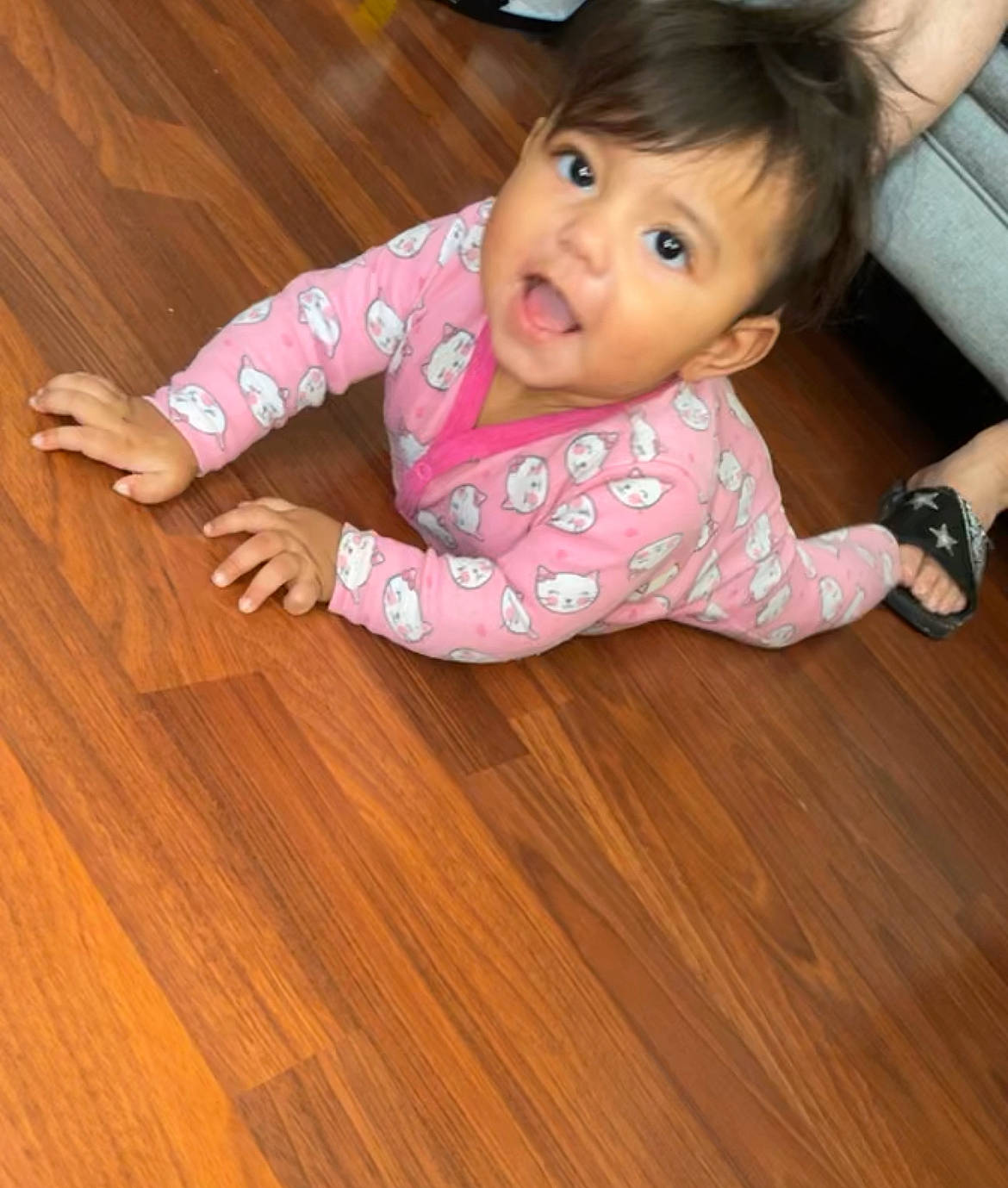 Sea'Onna joined the competition — help win amazing prizes! baby, baby_toddler_clothing, cheek, eye, facial_expression, finger, floor, flooring, hardwood, head, laminate_flooring, nose, person, skin, sleeve, smile, standing, toddler, watch, wood