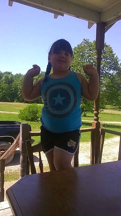 Kourtney is registered to the contest to win money with this photo: abdomen, arm, day, fun, grass, leisure, male, muscle, person, physical_fitness, recreation, shorts, shoulder, summer, tree, trunk, vacation