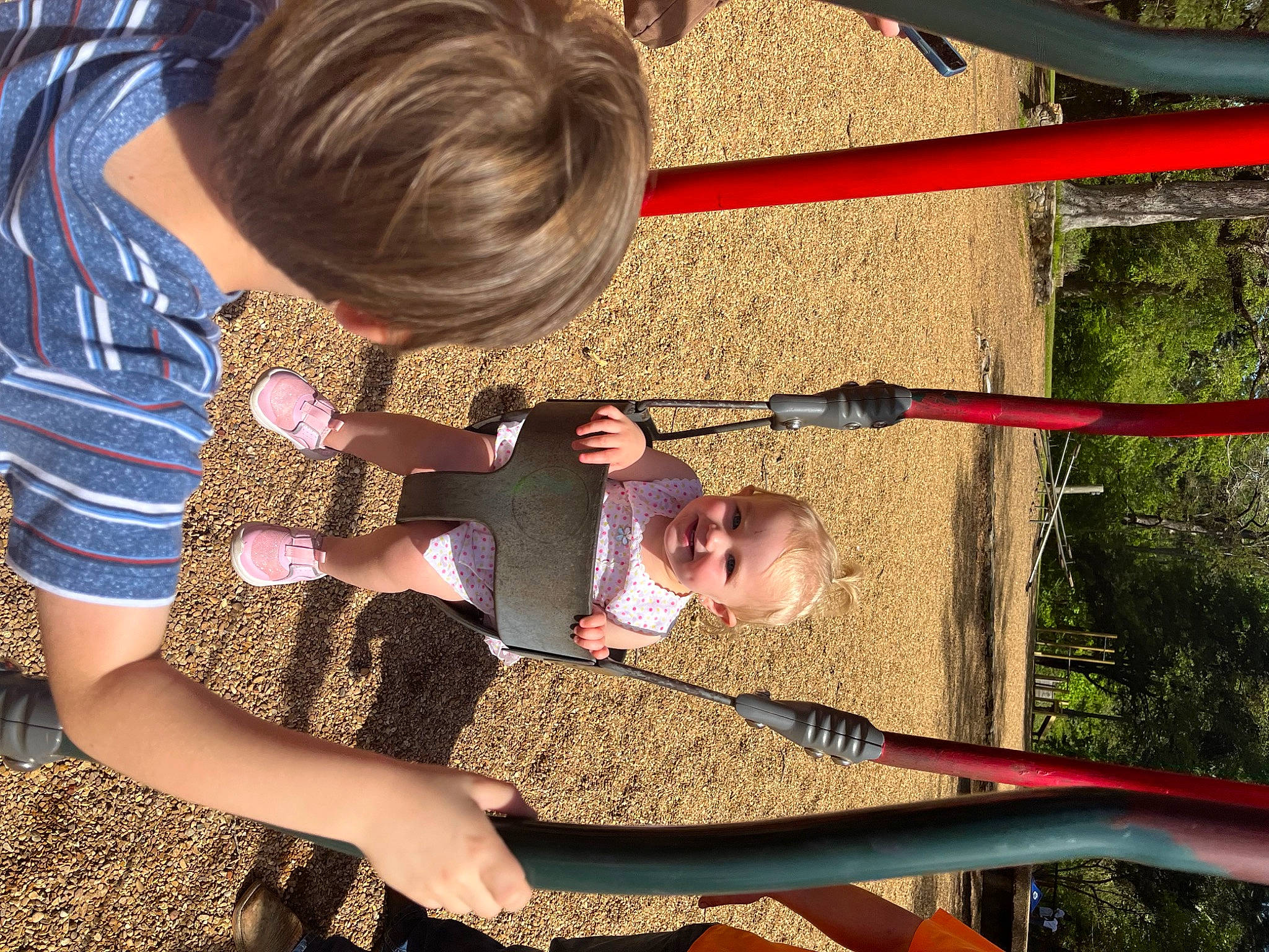 Blakelynn is registered to the contest to win money with this photo: child, city, fun, grass, happy, human_leg, joy, leisure, mammal, outdoor_play_equipment, people_in_nature, person, play, playground, recreation, snapshot, t_shirt, thigh, toddler, tree