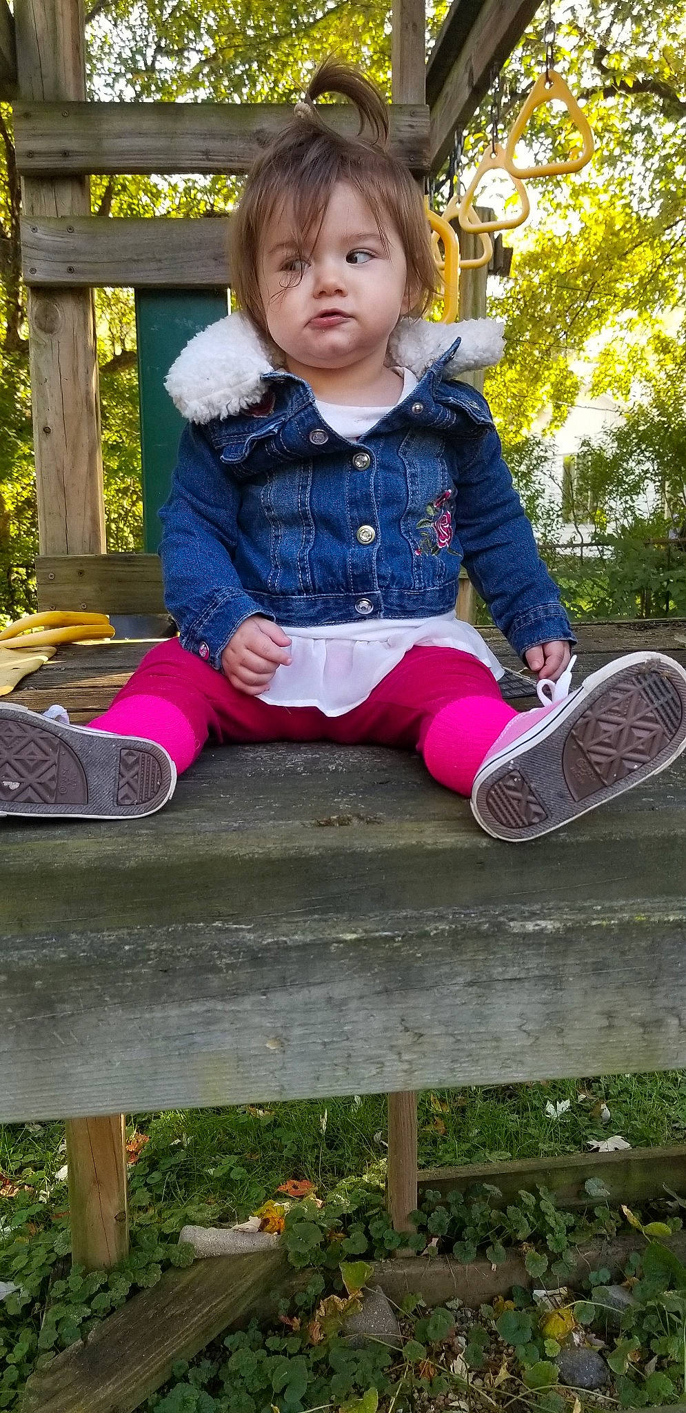 Jenny joined the competition — help win amazing prizes! child, fun, garden, girl, grass, lawn, outdoor_play_equipment, person, plant, play, playground, public_space, recreation, sitting, smile, toddler, tree, vacation